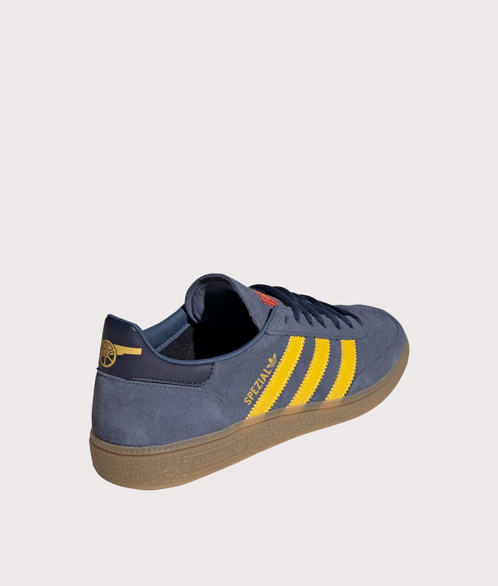 adidas Originals Arsenal FC Handball Spezial Trainers in Preloved Ink, Hazy yellow and Collegiate Navy at EQVVS Menswear. Angled back shot.