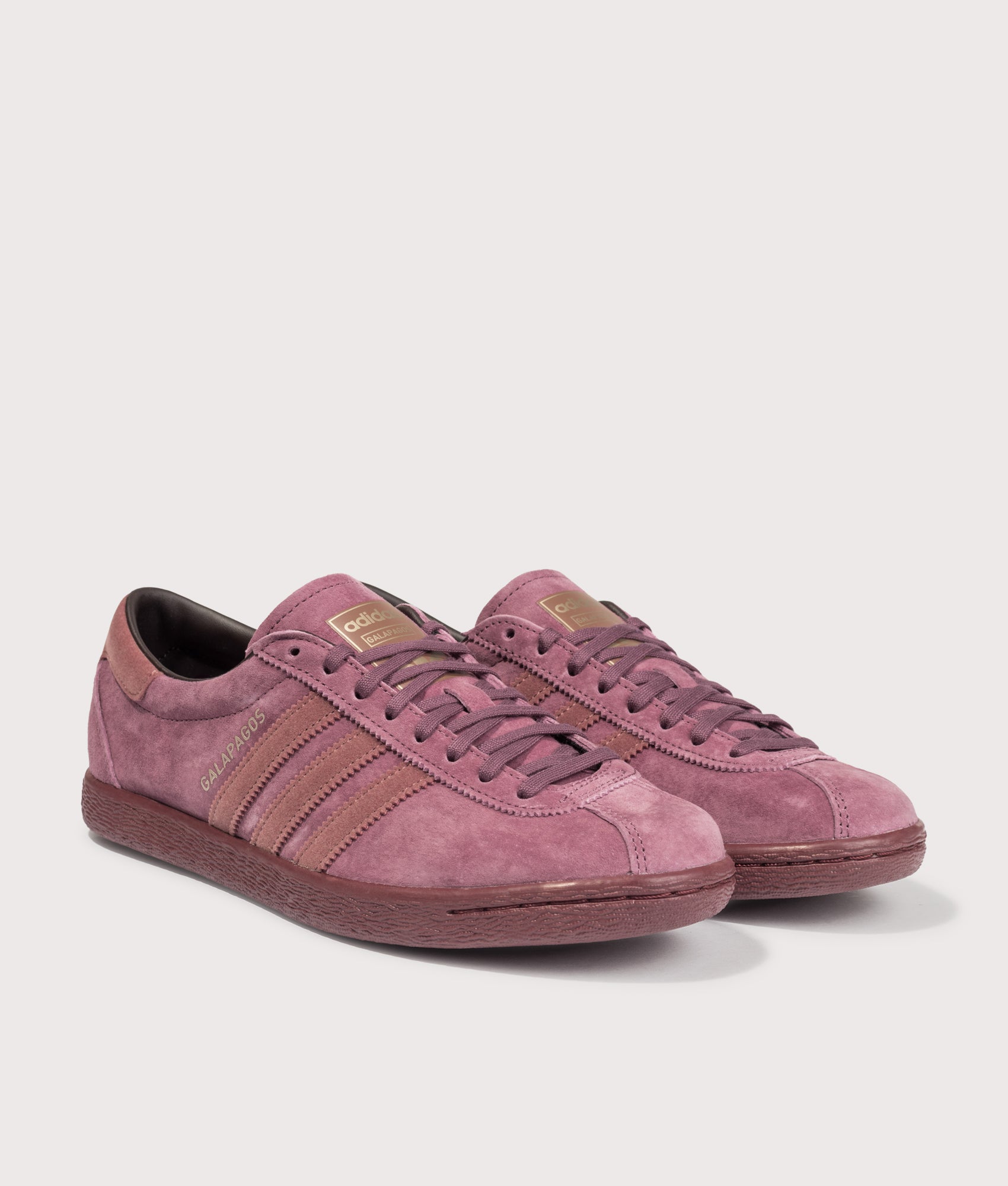 adidas Originals Galapagos Trainers in Burgundy, Wild Sepia and Fox Brown at EQVVS Menswear. Angled front shot.
