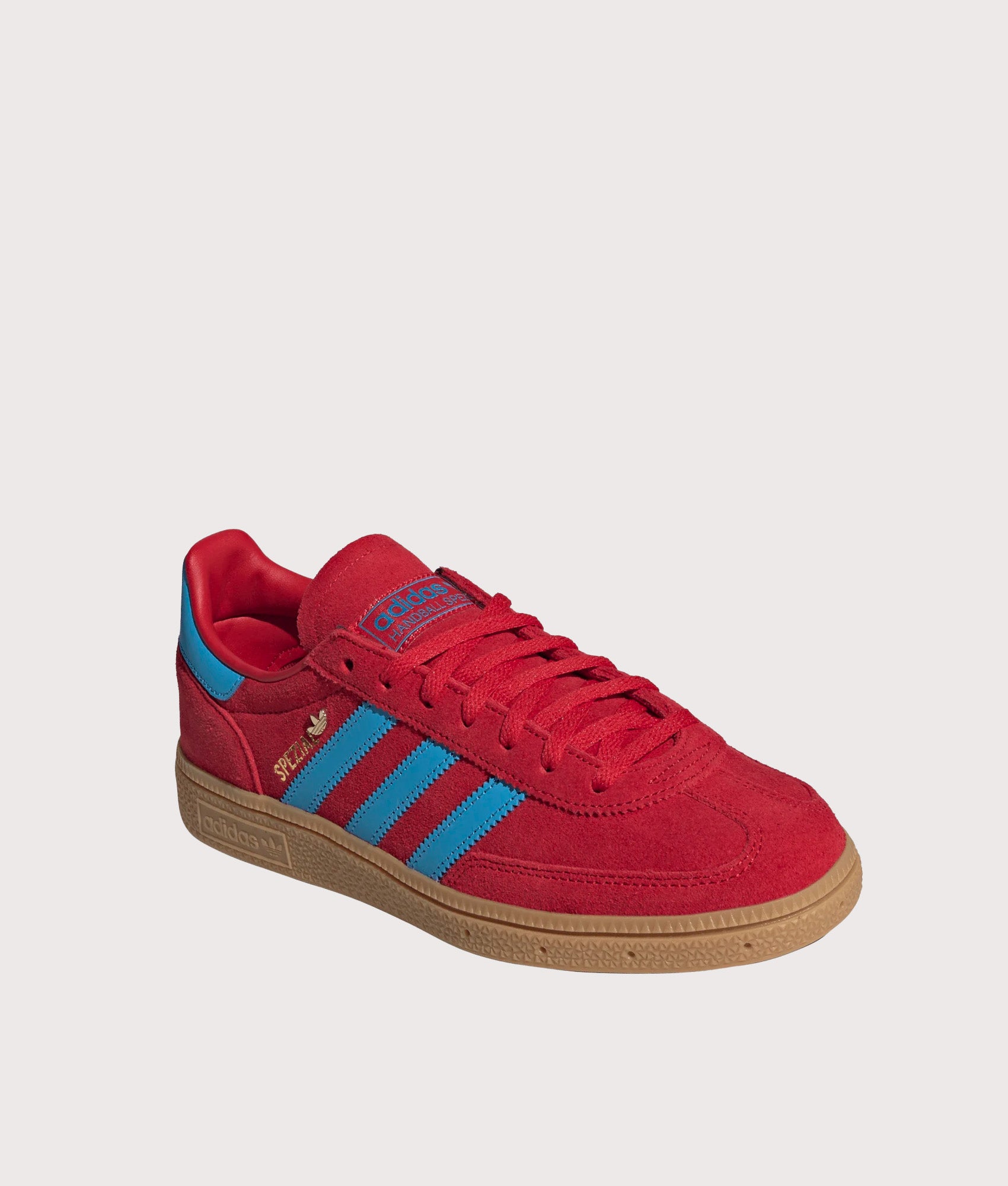 adidas Originals Handball Spezial Trainers in Better Scarlet, Lucid Aqua and Gold Metallic at EQVVS Menswear. Angled front shot.