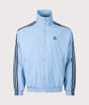 Firebird Track Top by adidas Originals in Ash Blue/Black. Shot by EQVVS. Front shot.
