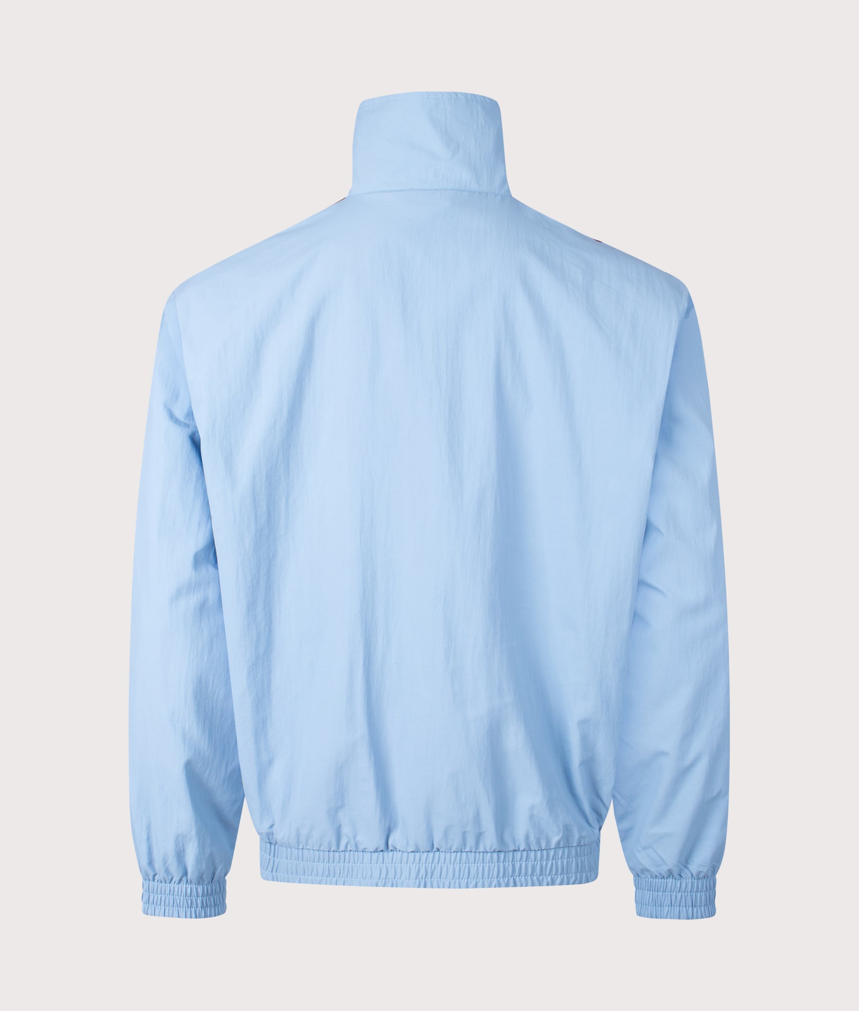 adidas Originals Firebird Track Top in Ash Blue/Black at EQVVS Menswear. Back shot.