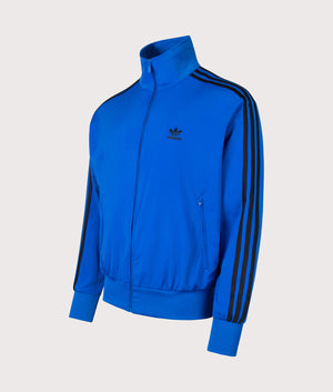 Firebird Track Top by adidas Originals in Blue/Black. Shot by EQVVS. Front angled Shot.