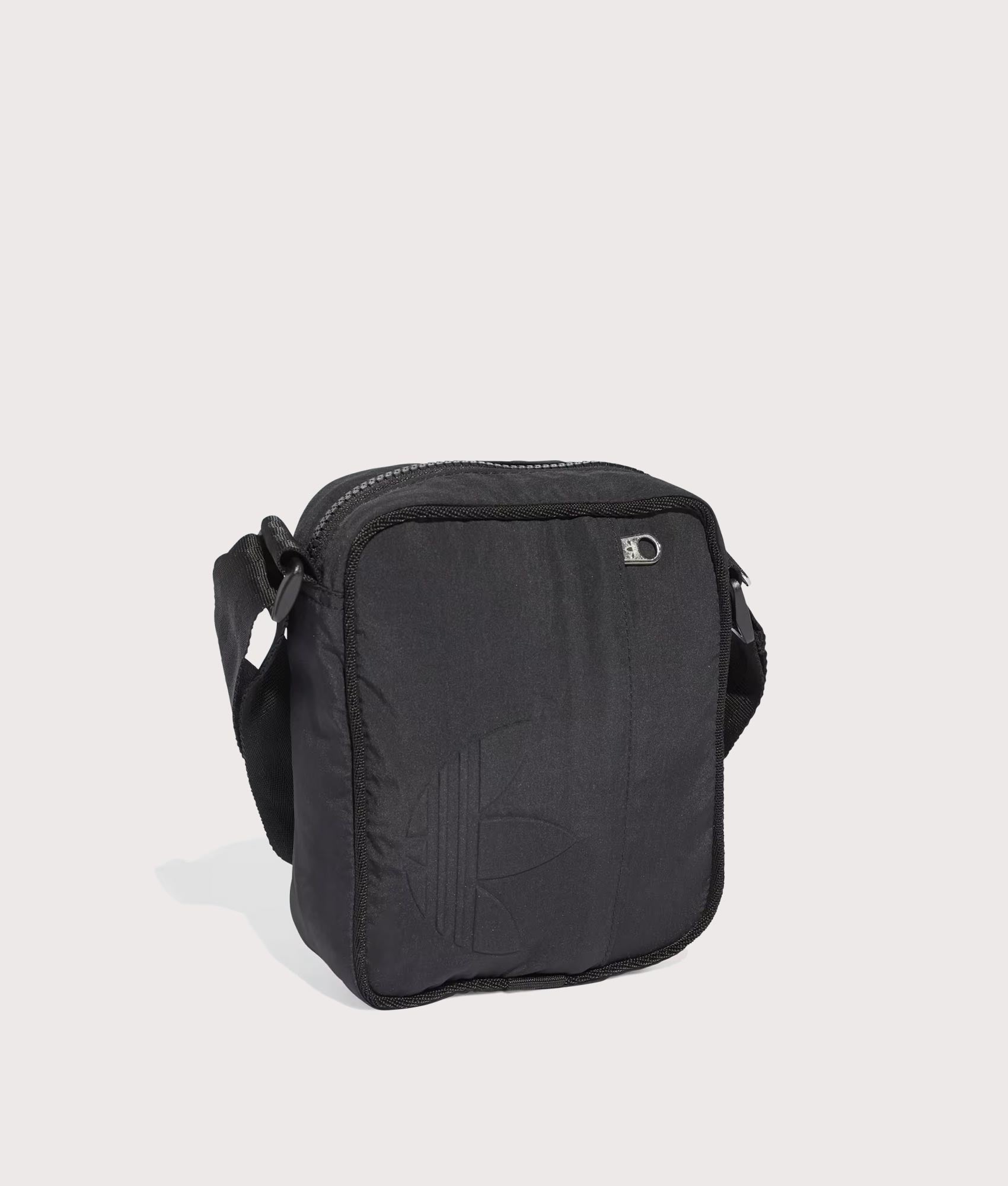 adidas Originals Everyday Icons Small Item Bag in Black at EQVVS Menswear. Angled front shot.
