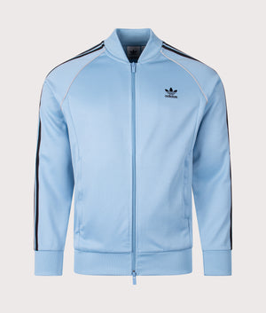 SST Track Top by adidas Originals in Sky Blue/White. Shot by EQVVS. Front  shot.