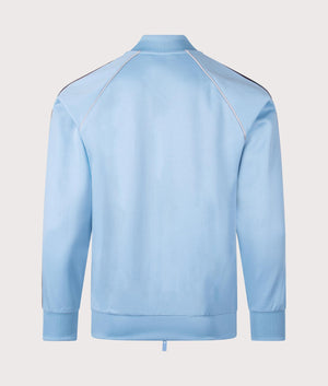 SST Track Top by adidas Originals in Sky Blue/White. Shot by EQVVS. Back shot.