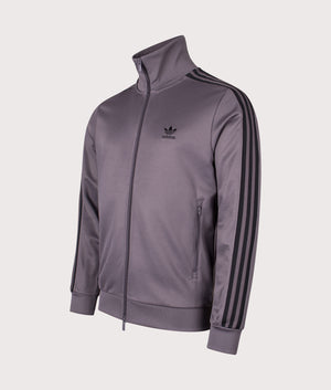 Classic Track Top by adidas Oiginals in Green Strata/Black. Shot by EQVVS. Front angled shot.