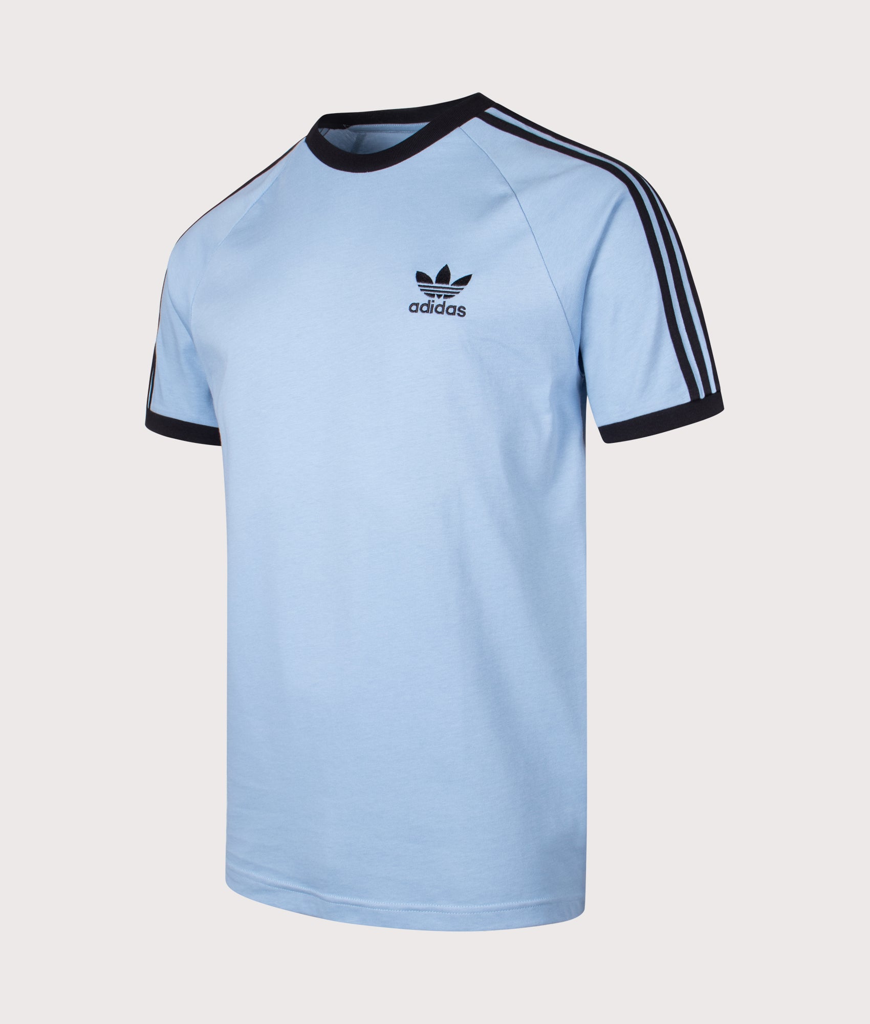 Slim Fit Adicolour 3 Stripes T-Shirt. Shot by EQVVS. Front angled shot.