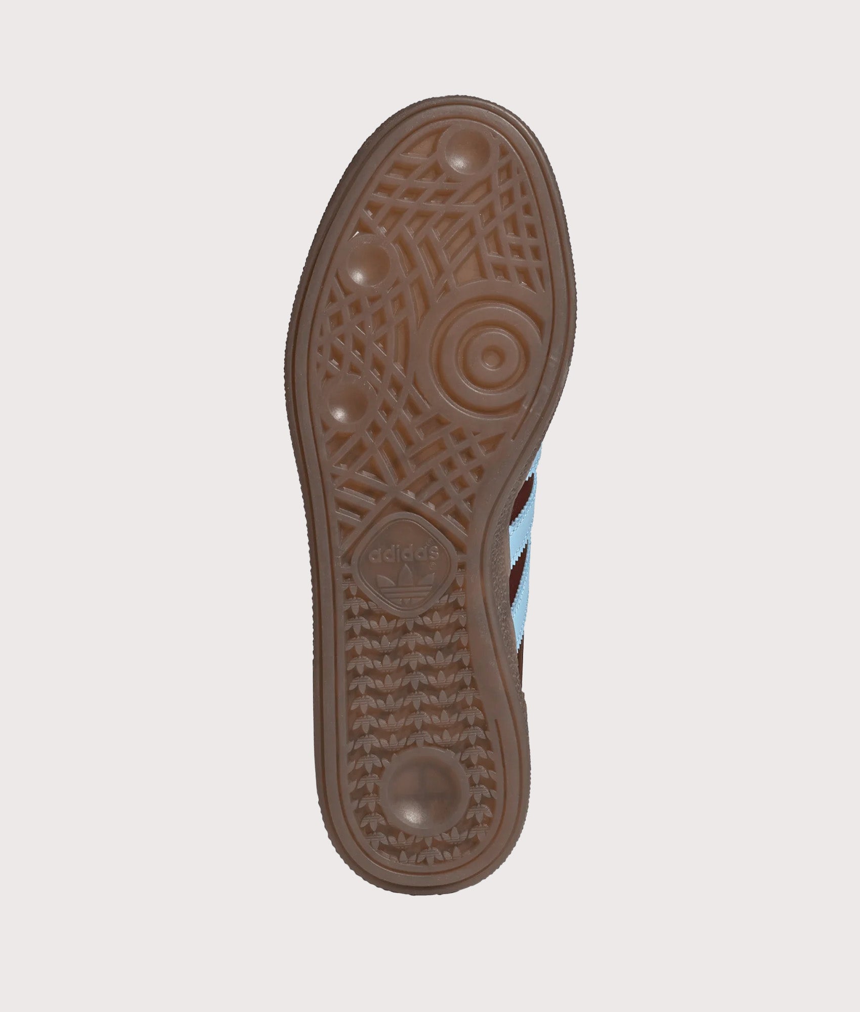 adidas Originals Handball Spezial Trainers in Fox Brown, Clear Sky and Gum 5 at EQVVS Menswear. Tread shot.