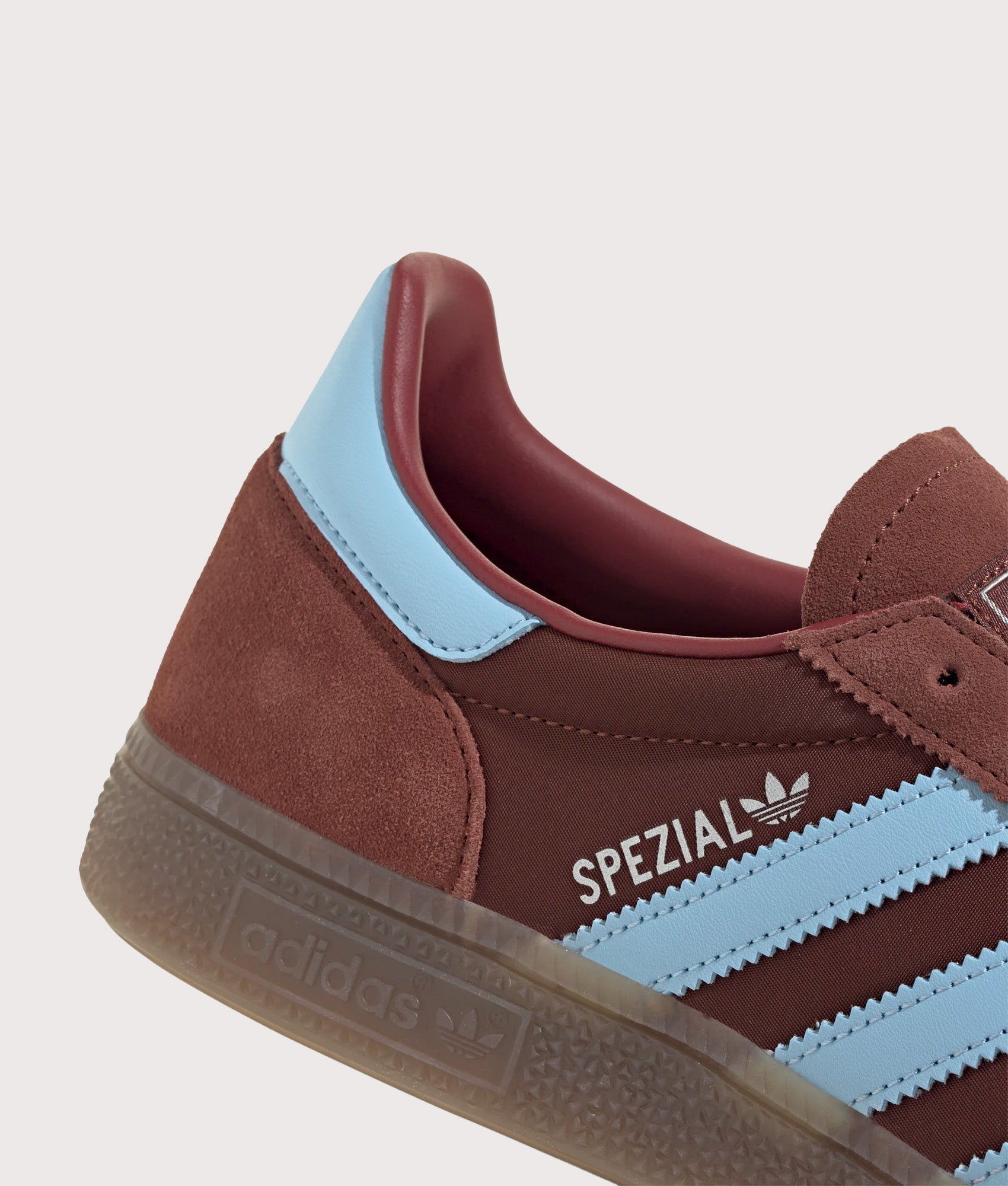 adidas Originals Handball Spezial Trainers in Fox Brown, Clear Sky and Gum 5 at EQVVS Menswear. Detail shot.