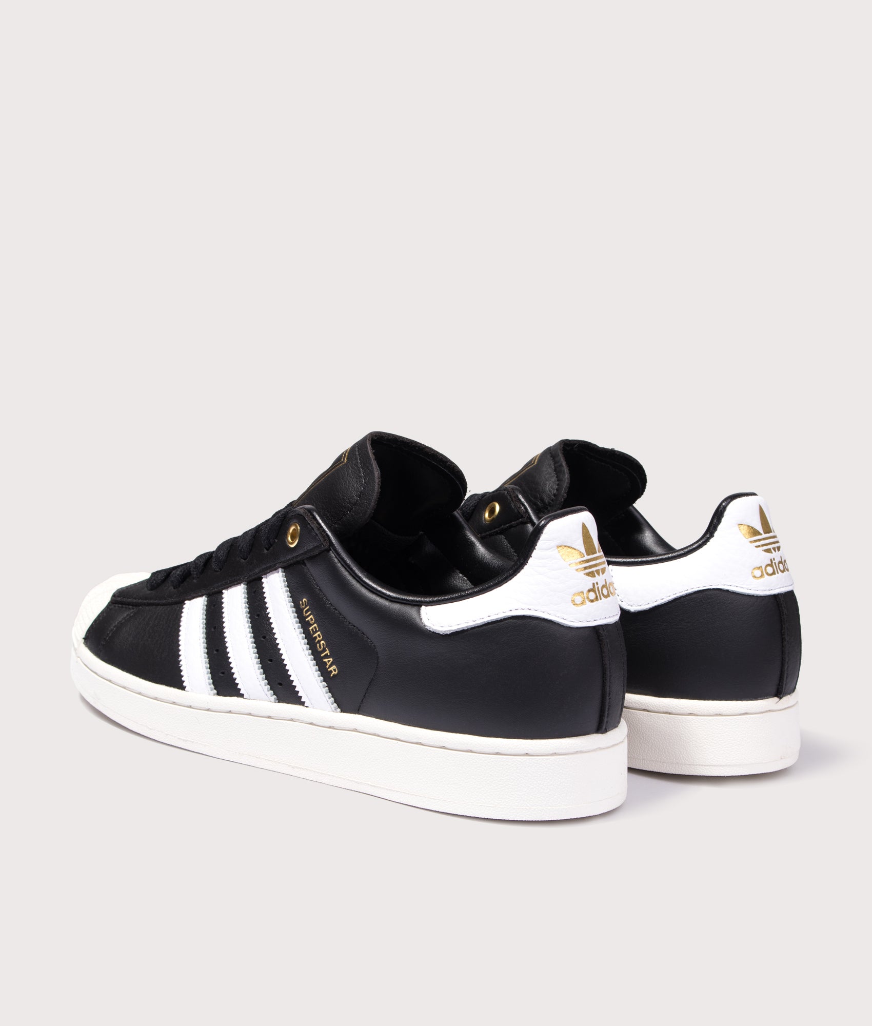 adidas Originals Superstar II Trainers in Core Black, Cloud White and Off White at EQVVS Menswear. Angled back shot.