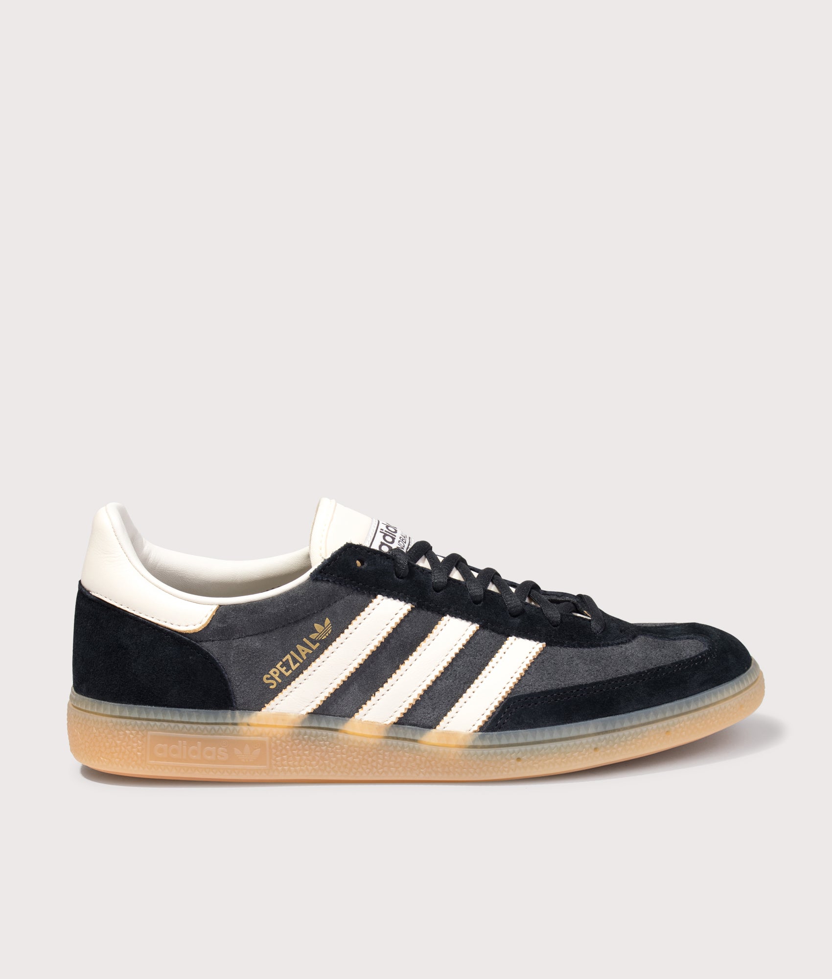 adidas Originals Handball Spezial Trainers in Carbon/Off White/Core Black at EQVVS Menswear. Side shot.