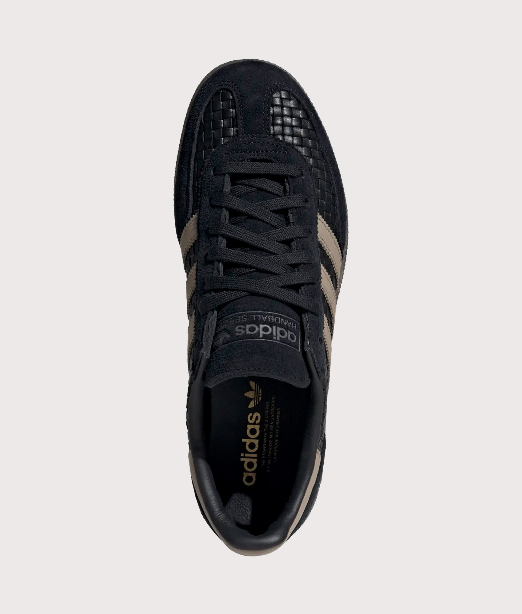 adidas Originals Basket Weave Handball Spezial Trainers in Core Black, Trace Khaki and Gum 5 at EQVVS Menswear. Top shot.