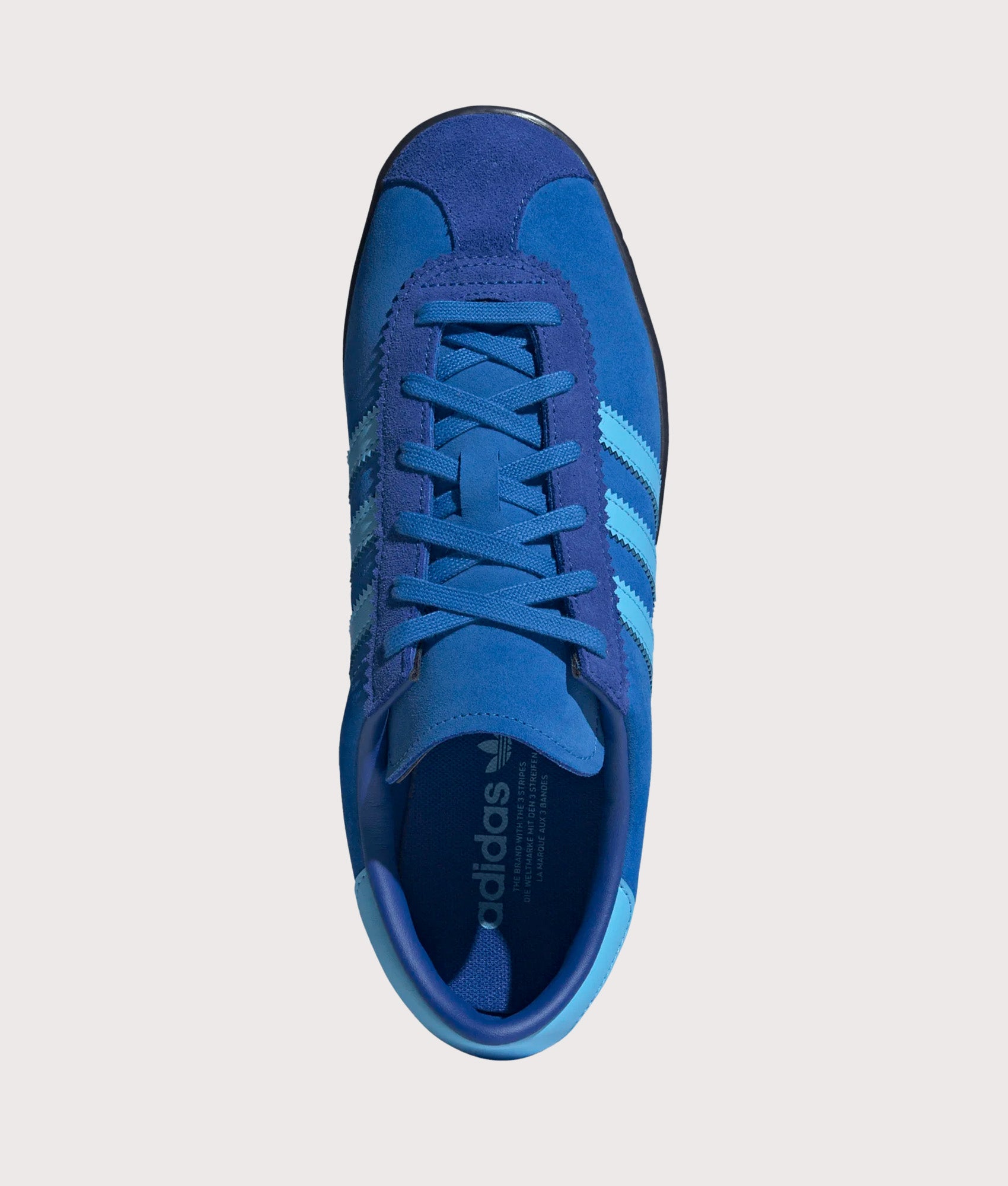 adidas Originals Stadt Trainers in Bright Royal, Semi Blue Burst and Shadow Navy at EQVVS Menswear. Top shot.