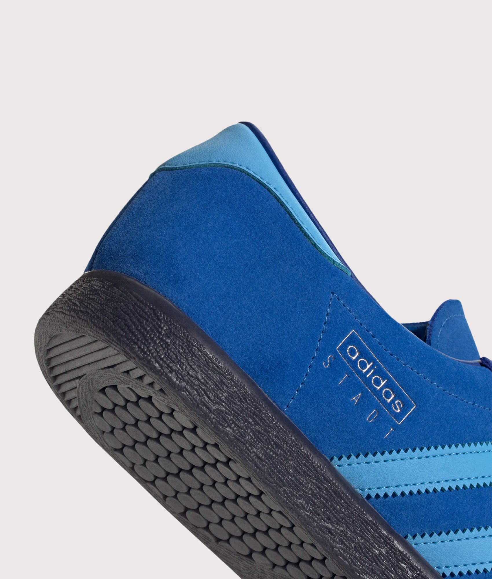 adidas Originals Stadt Trainers in Bright Royal, Semi Blue Burst and Shadow Navy at EQVVS Menswear. Detail shot.