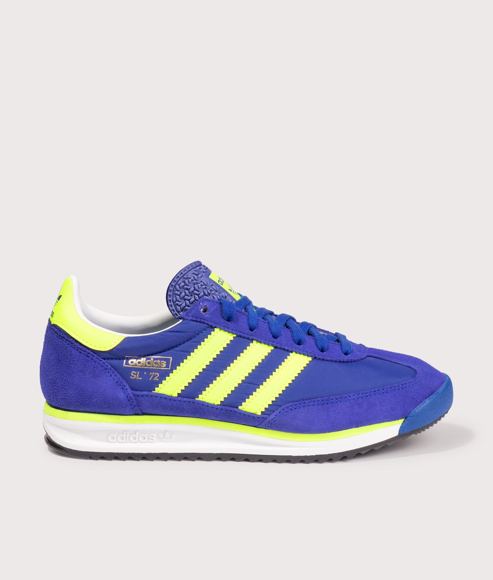 adidas Originals SL 72 RS Trainers in the Royal Blue, Solar Yellow and Footwear White at EQVVS Menswear. Side shot.