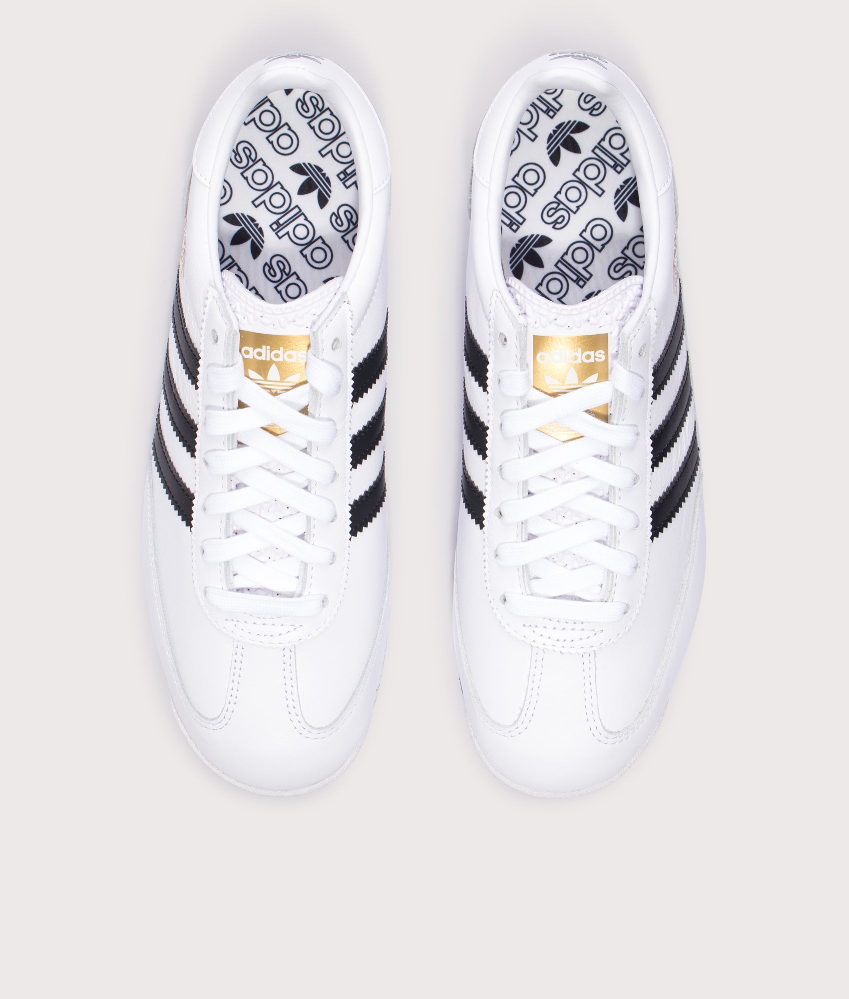 adidas Originals in Cloud White, Core Black and Blue Bird at EQVVS Menswear. Top shot.