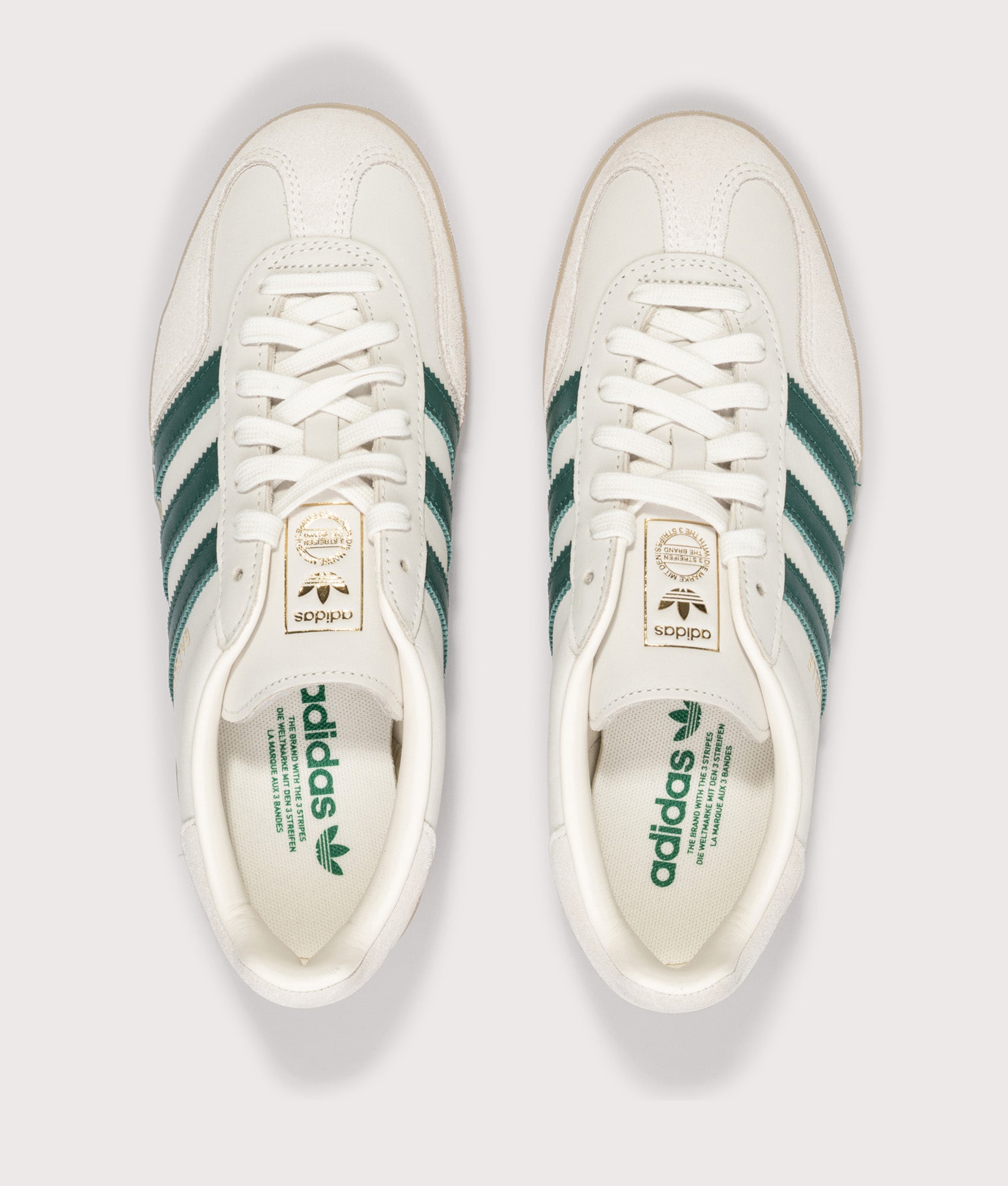 adidas Originals Gazelle Indoor Trainers in Cream White, Collegiate Green and Gum3 at EQVVS Menswear. Above shot.