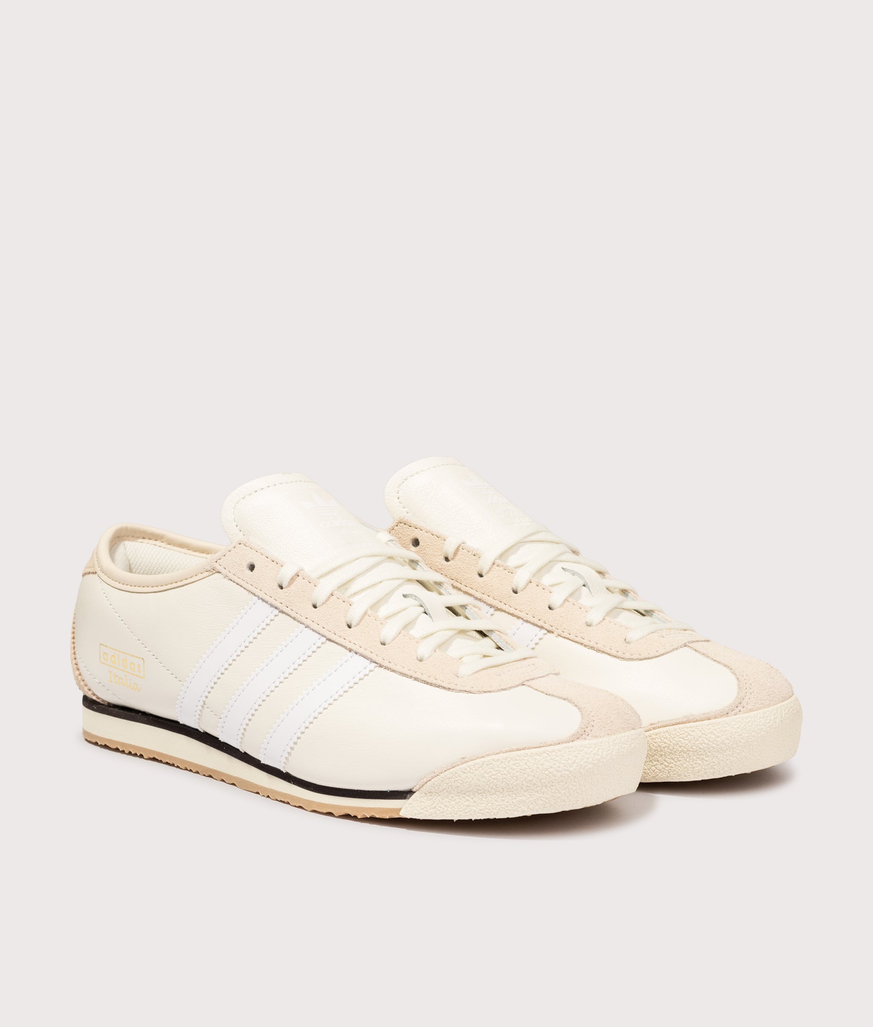 adidas Original Italia 70s Trainers in Off White, Cloud White and Wonder White at EQVVS Menswear. Angled front shot.