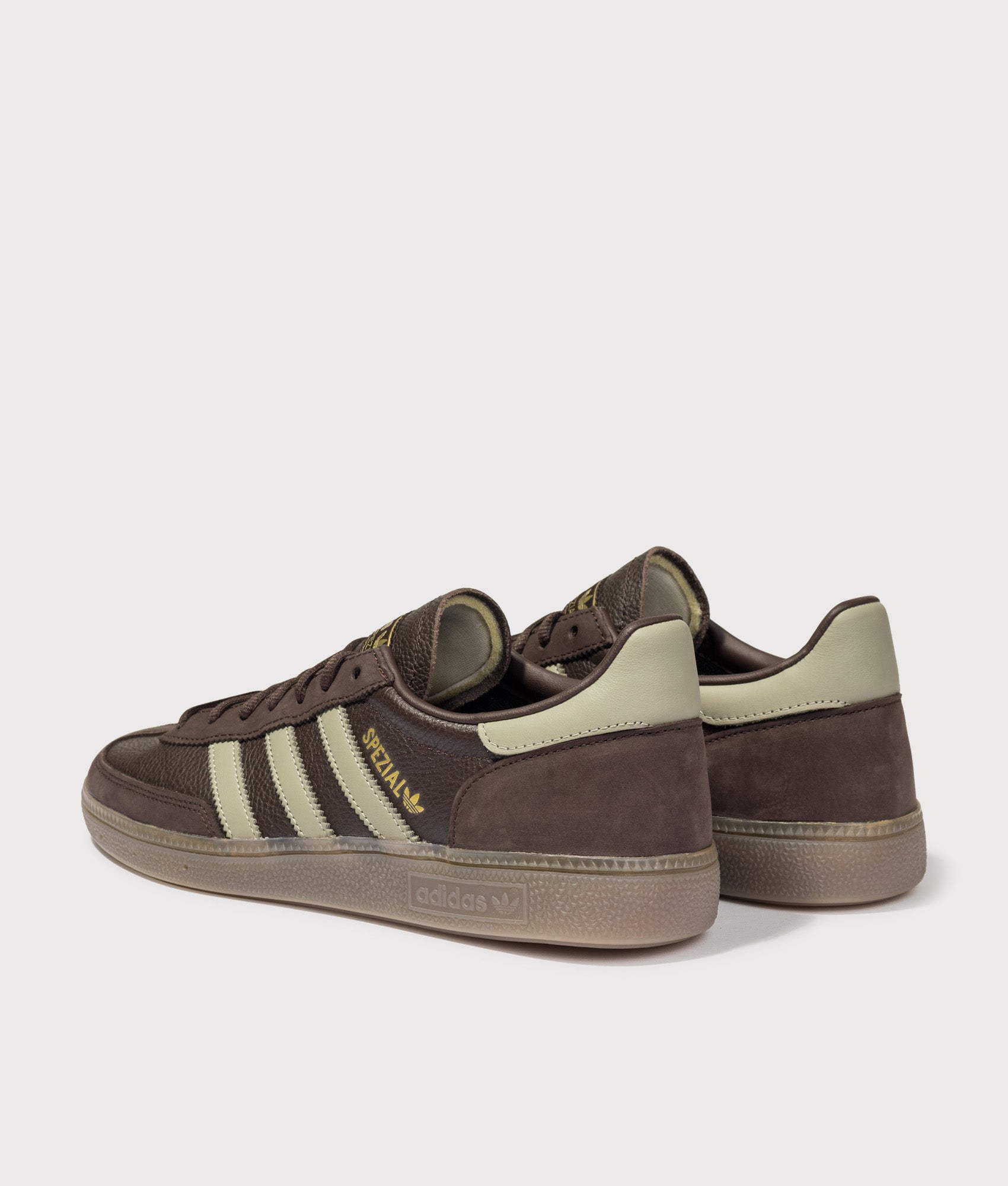 adidas Originals Handball Spezial Trainers in Aurora Coffee, Silver Pebble and Gum 5 at EQVVS Menswear. Angled back shot.