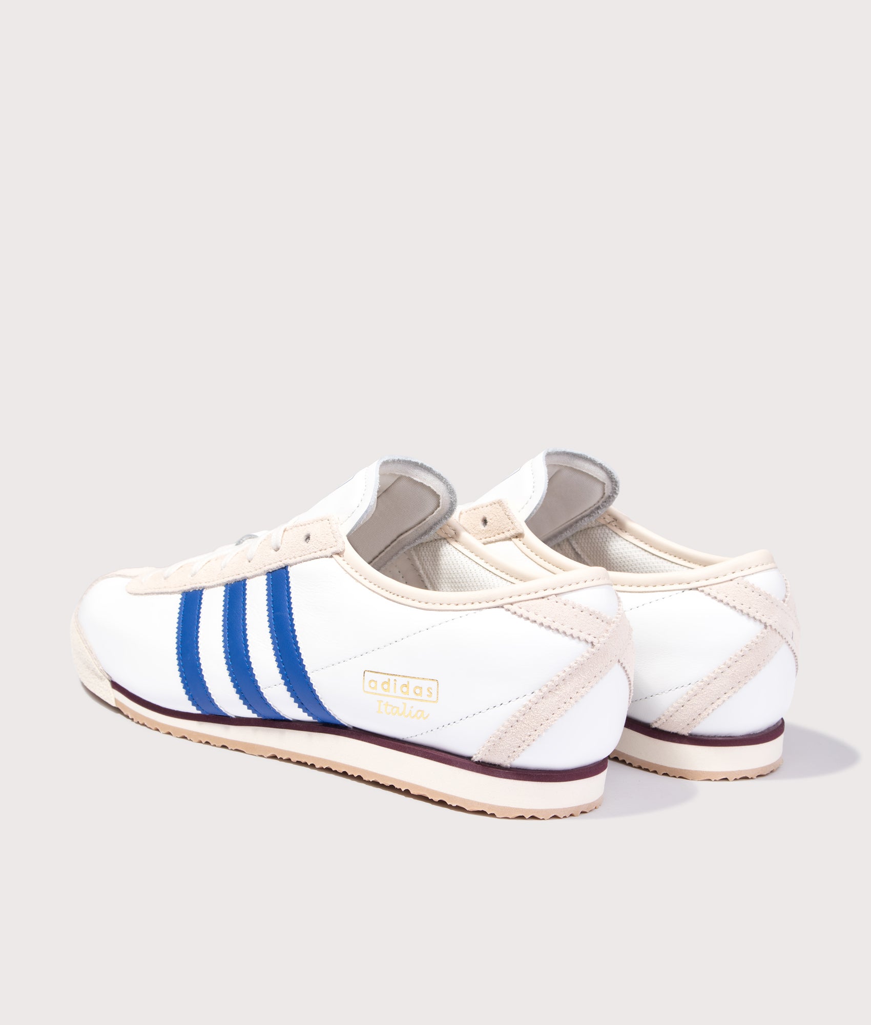 adidas Original Italia 70s Trainers in Cloud White, Royal Blue and Wonder White at EQVVS Menswear. Angled back shot.