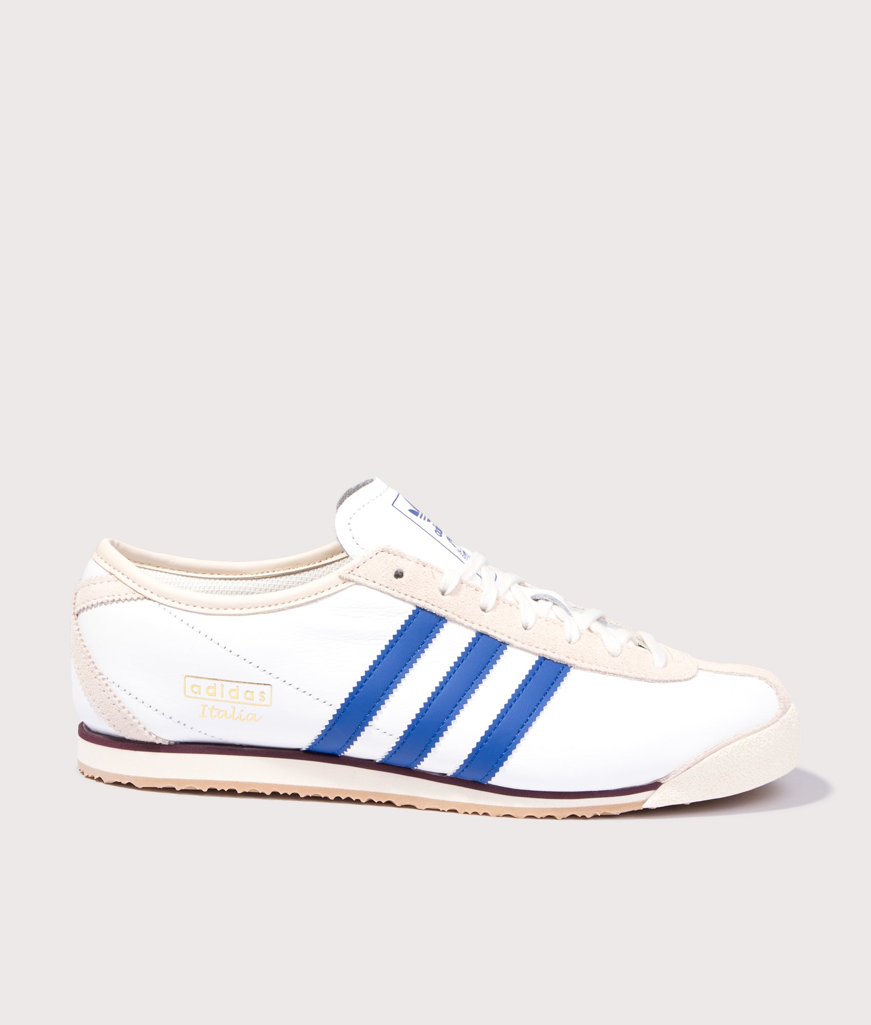 adidas Original Italia 70s Trainers in Cloud White, Royal Blue and Wonder White at EQVVS Menswear. Side shot.