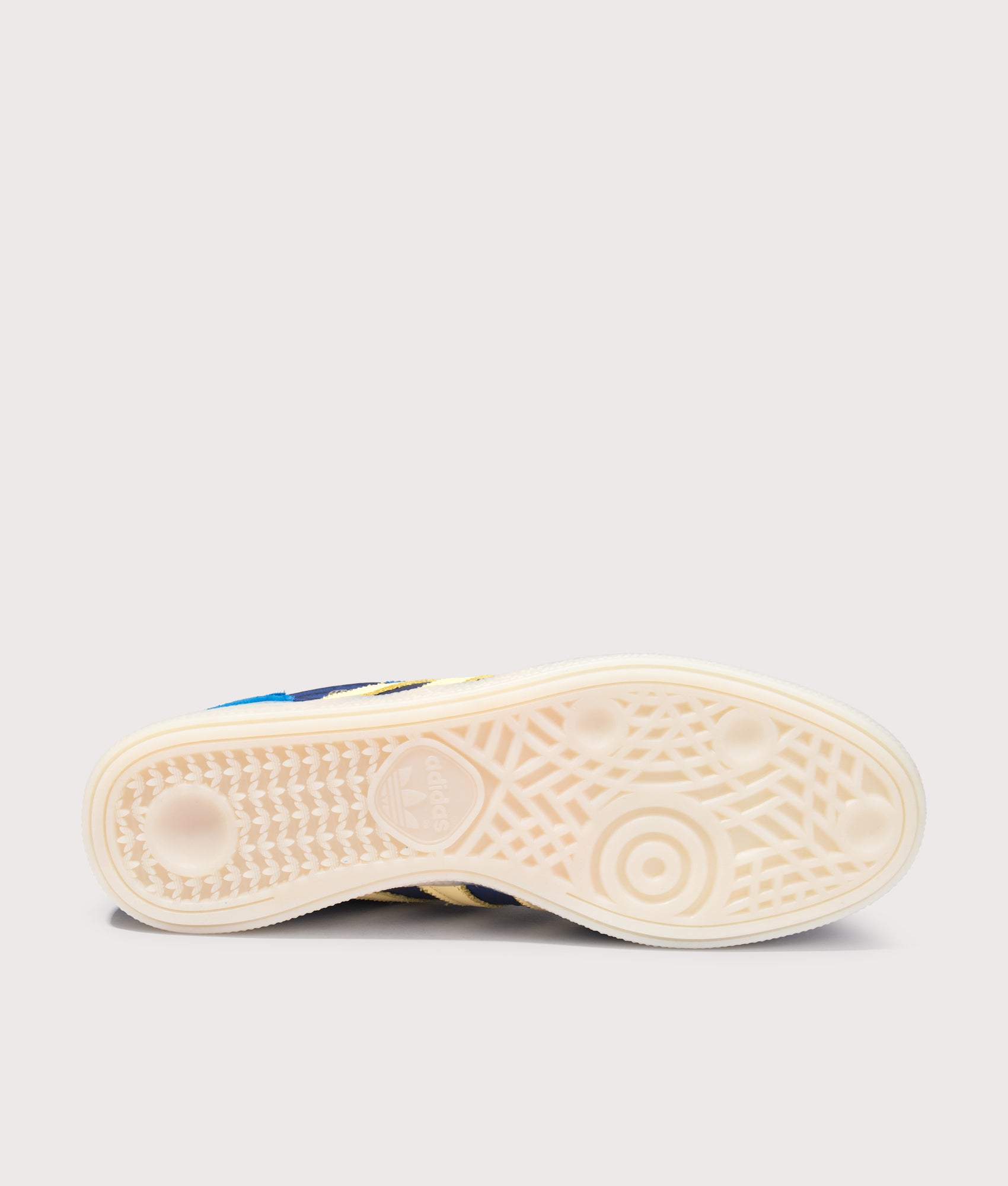 adidas Originals Handball Spezial Trainers in Equipment Blue, Almost Yellow and Off White at EQVVS Menswear. Tread shot.