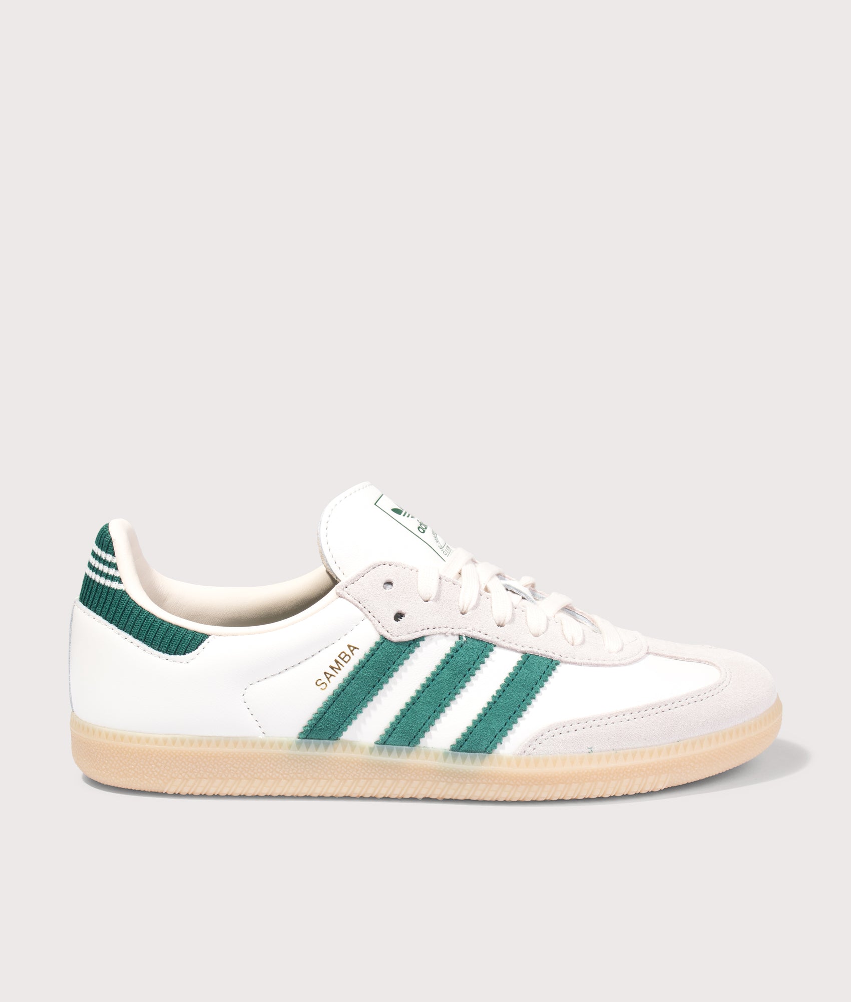 Samba OG Trainers in Cloud White/Collegiate Green/Gum by adidas. Shot by EQVVS. Front shot.