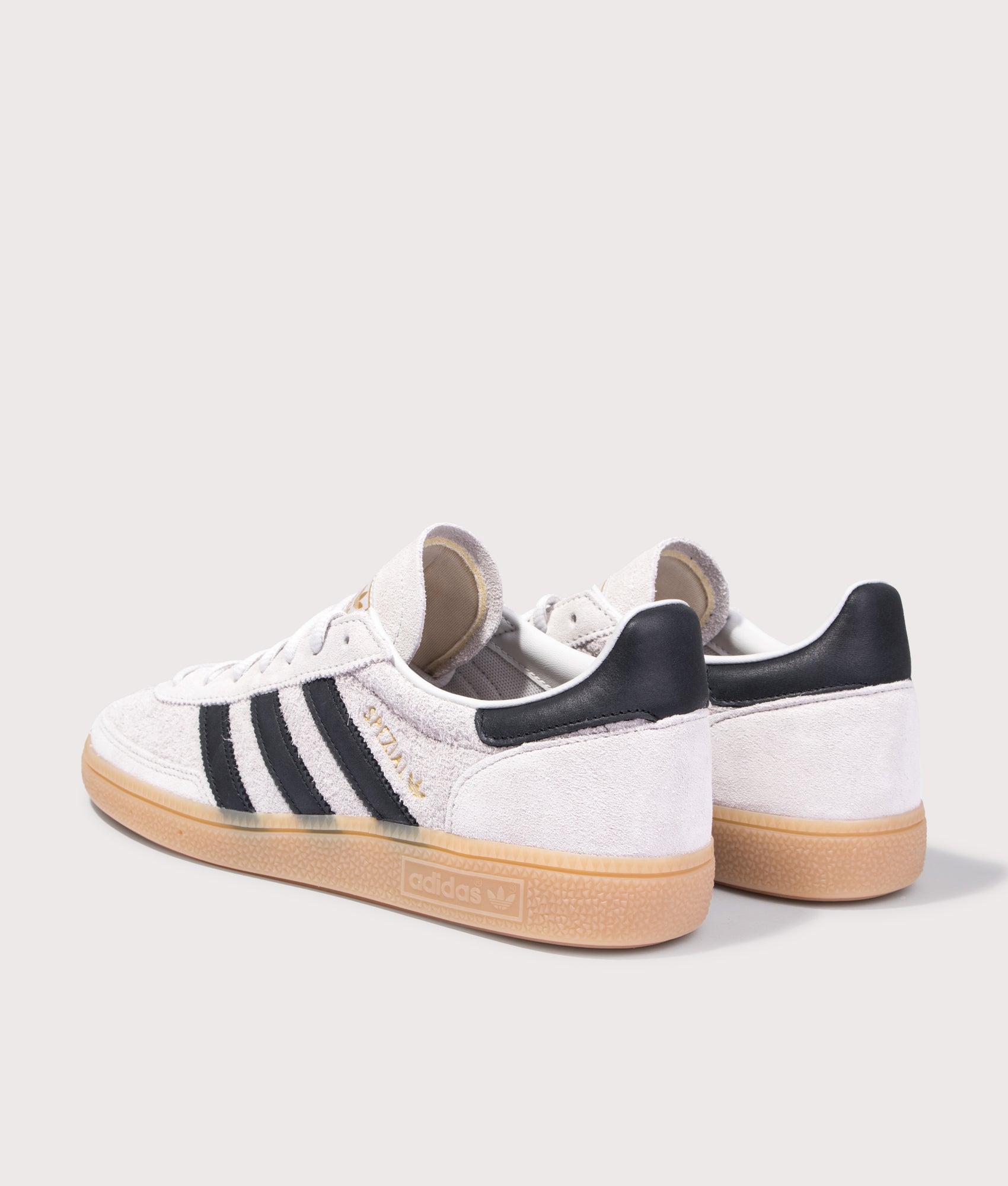 adidas Originals Handball Spezial Trainers in Grey One, Core Black and Gum4 at EQVVS Menswear. Angled back shot.