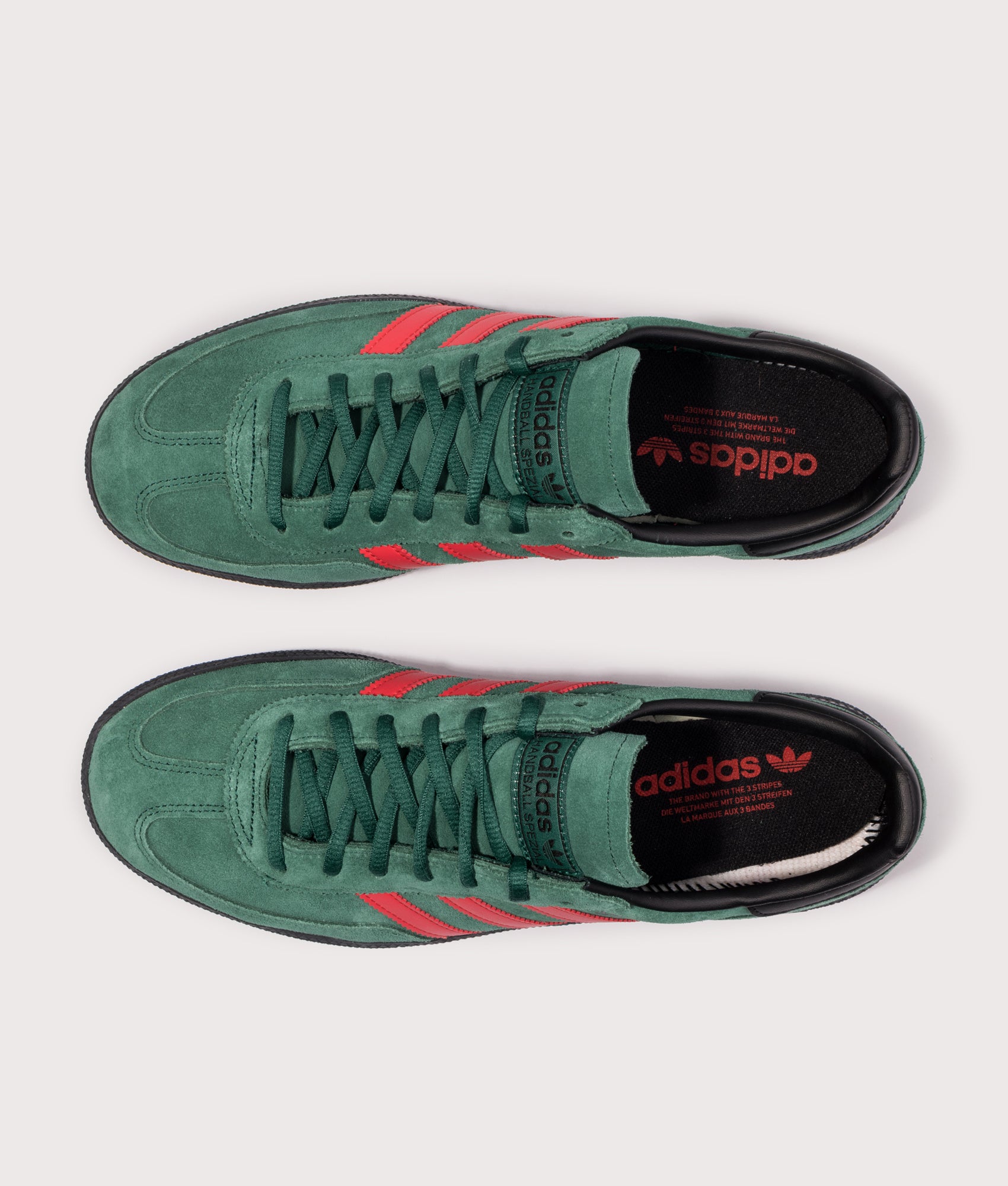 adidas Originals Handball Spezial Trainers in Collegiate Green, Red and Core Black at EQVVS Menswear. Top shot.