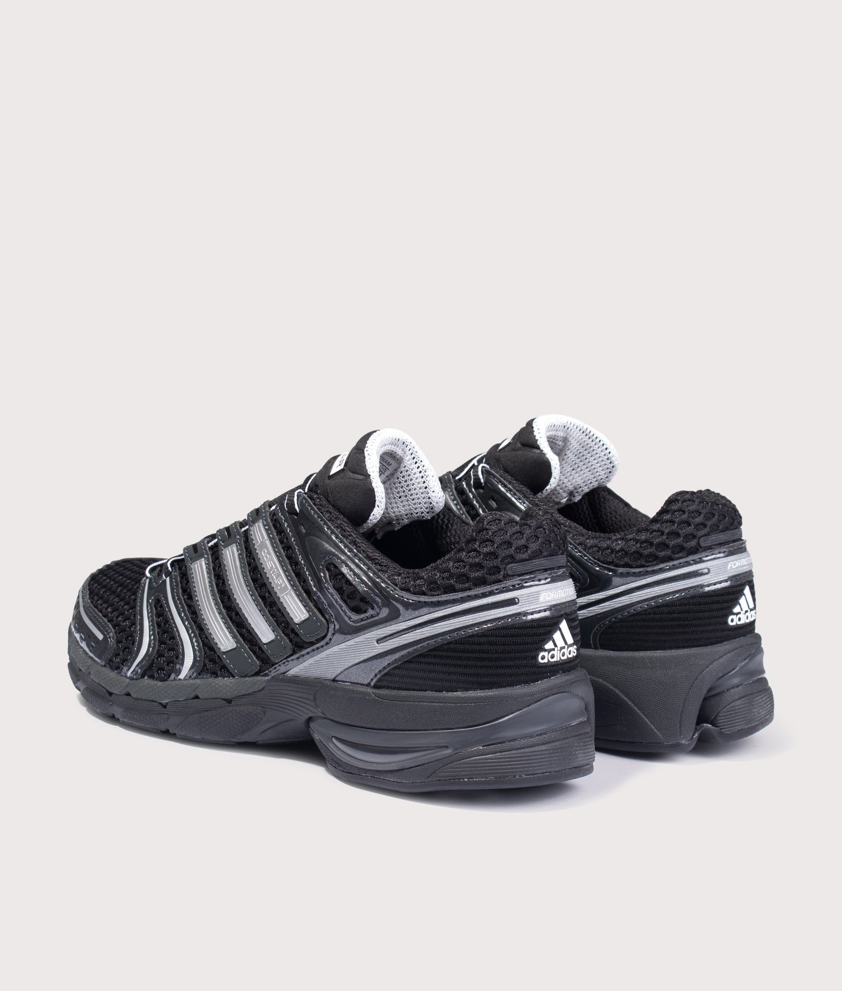 adidas Originals Adistar Control 5 Shoes in Core Black, Cloud White and Carbon at EQVVS Menswear. Angled back shot.