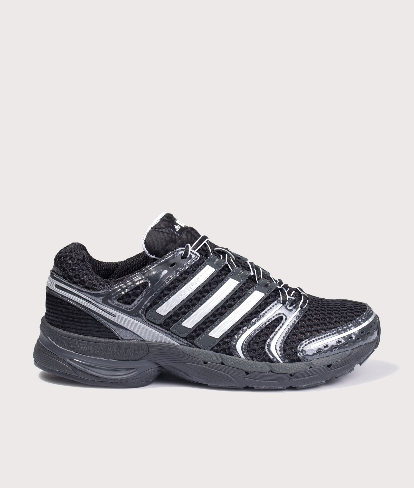 adidas Originals Adistar Control 5 Shoes in Core Black, Cloud White and Carbon at EQVVS Menswear. Side shot.