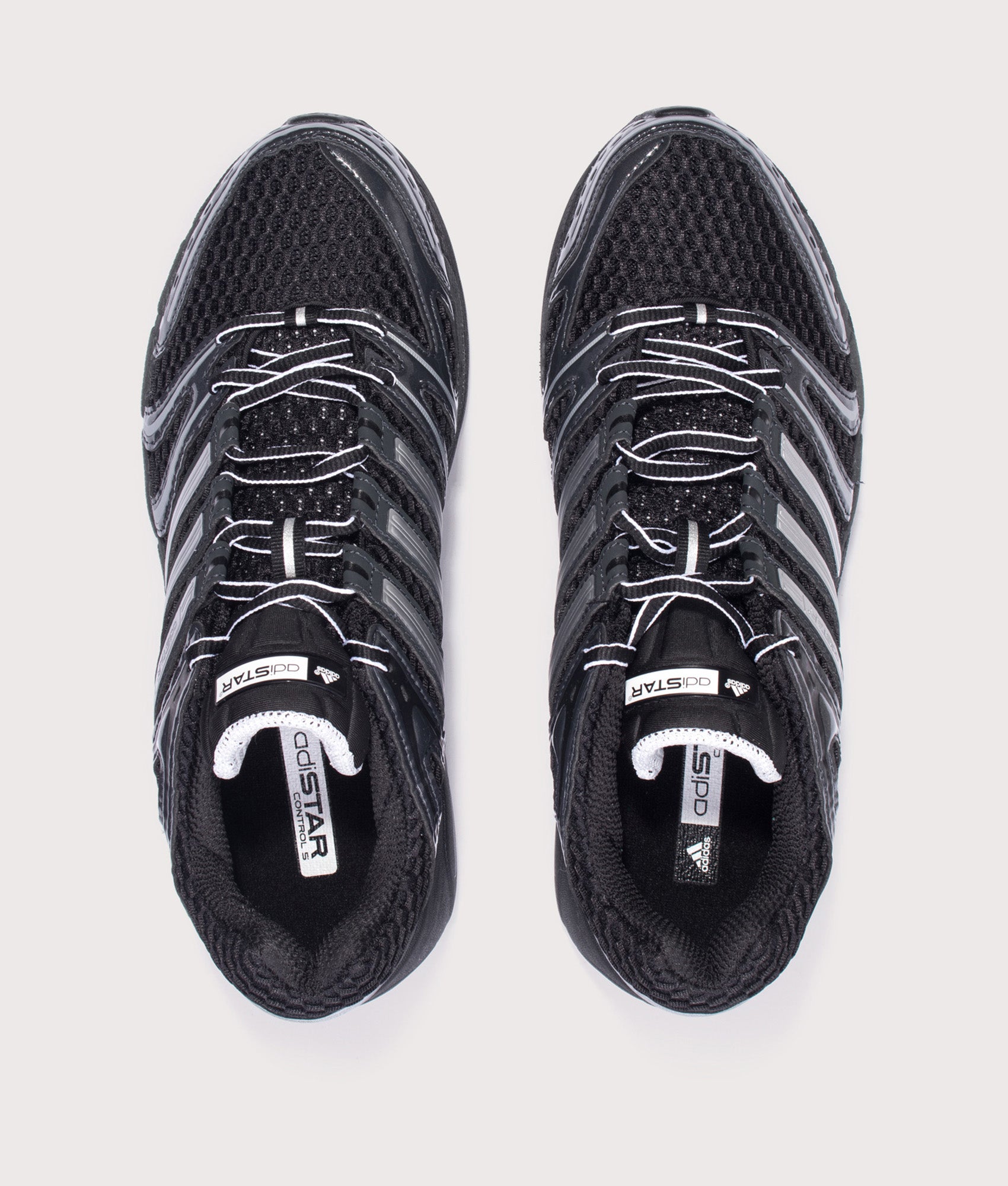 adidas Originals Adistar Control 5 Shoes in Core Black, Cloud White and Carbon at EQVVS Menswear. Top shot.