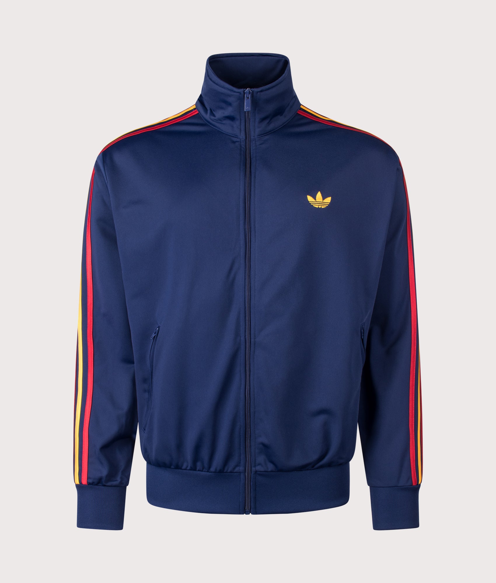 Loose Fit Firebird Track Top in Dark Blue/Crew Yellow/Team Power Red by adidas Originals. Shot by EQVVS. Front shot.