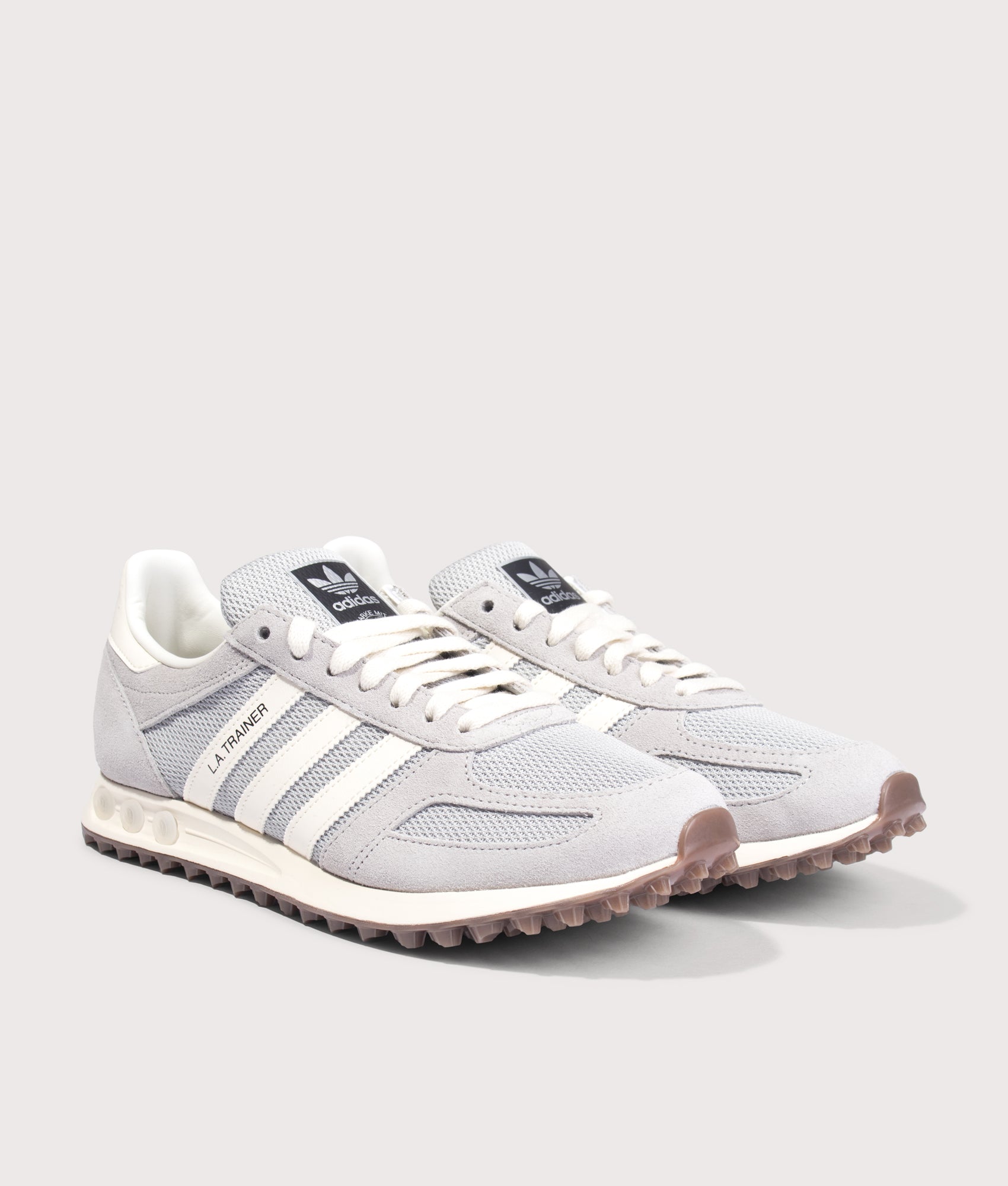 adidas Originals LA Trainer OG in Grey Two, Grey One and Off White at EQVVS Menswear. Angled front shot.