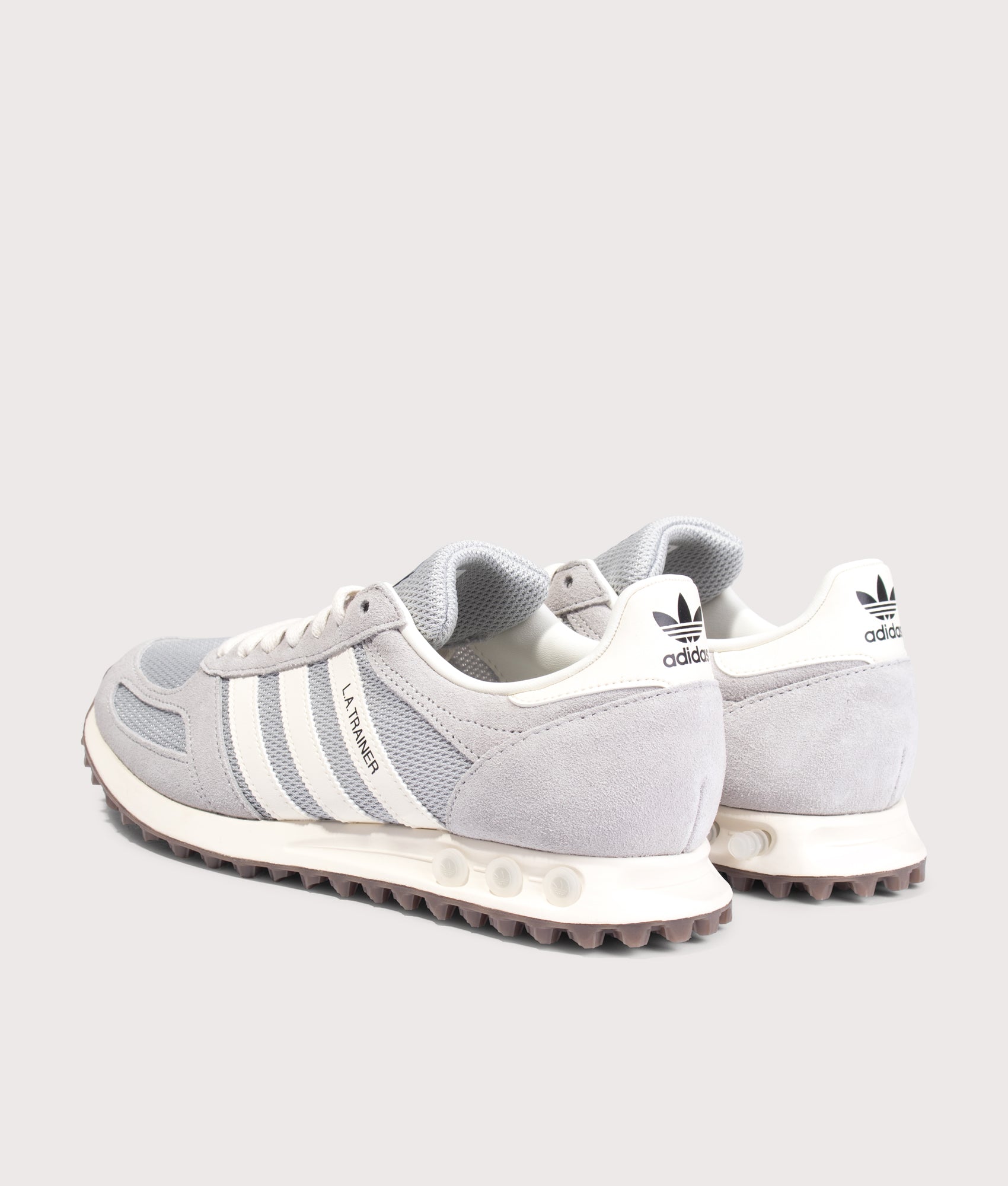 adidas Originals LA Trainer OG in Grey Two, Grey One and Off White at EQVVS Menswear. Angled front shot.