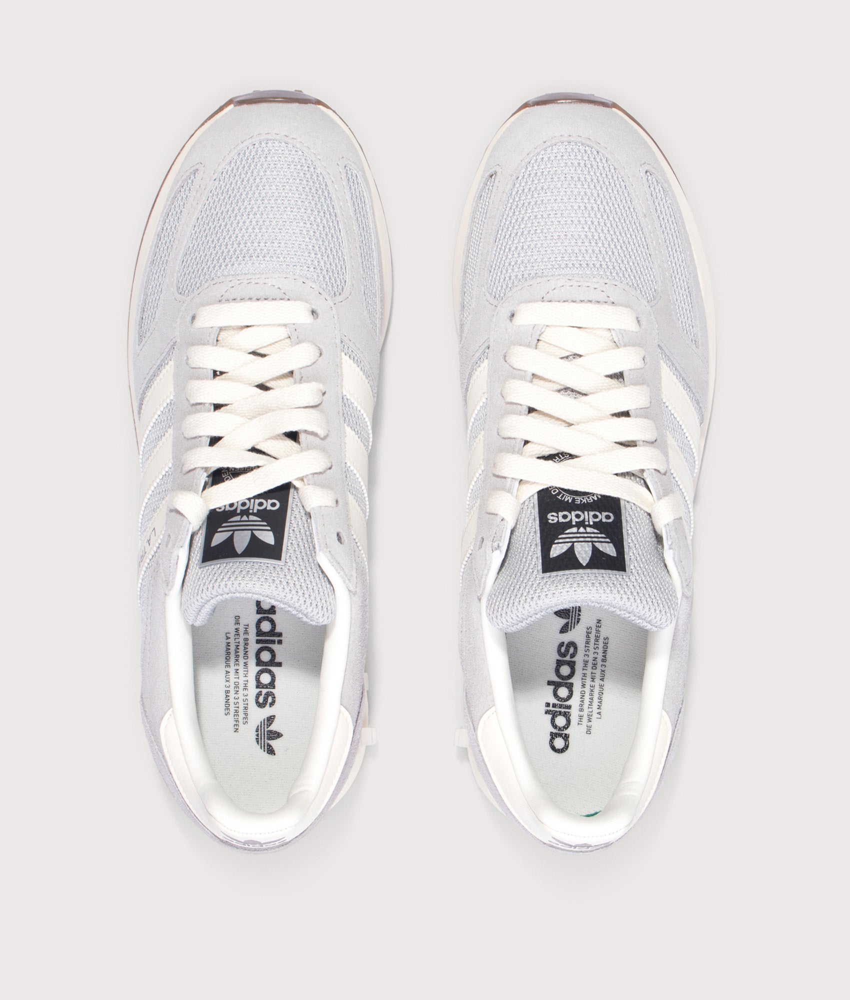 adidas Originals LA Trainer OG in Grey Two, Grey One and Off White at EQVVS Menswear. Top shot.