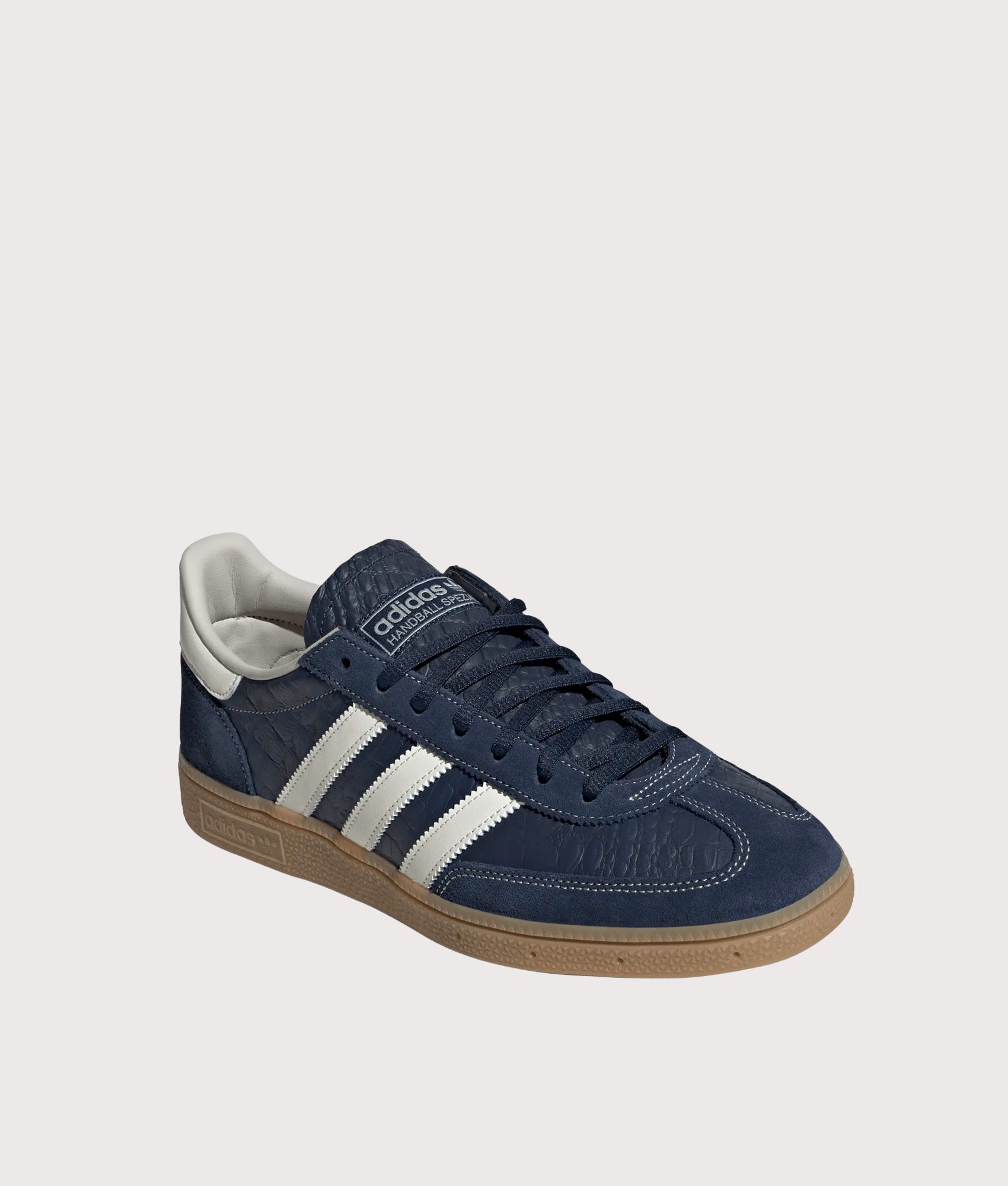 adidas Originals Handball Spezial Trainers in Night Indigo, Crew White and Gum 4 at EQVVS Menswear. Angled front shot.