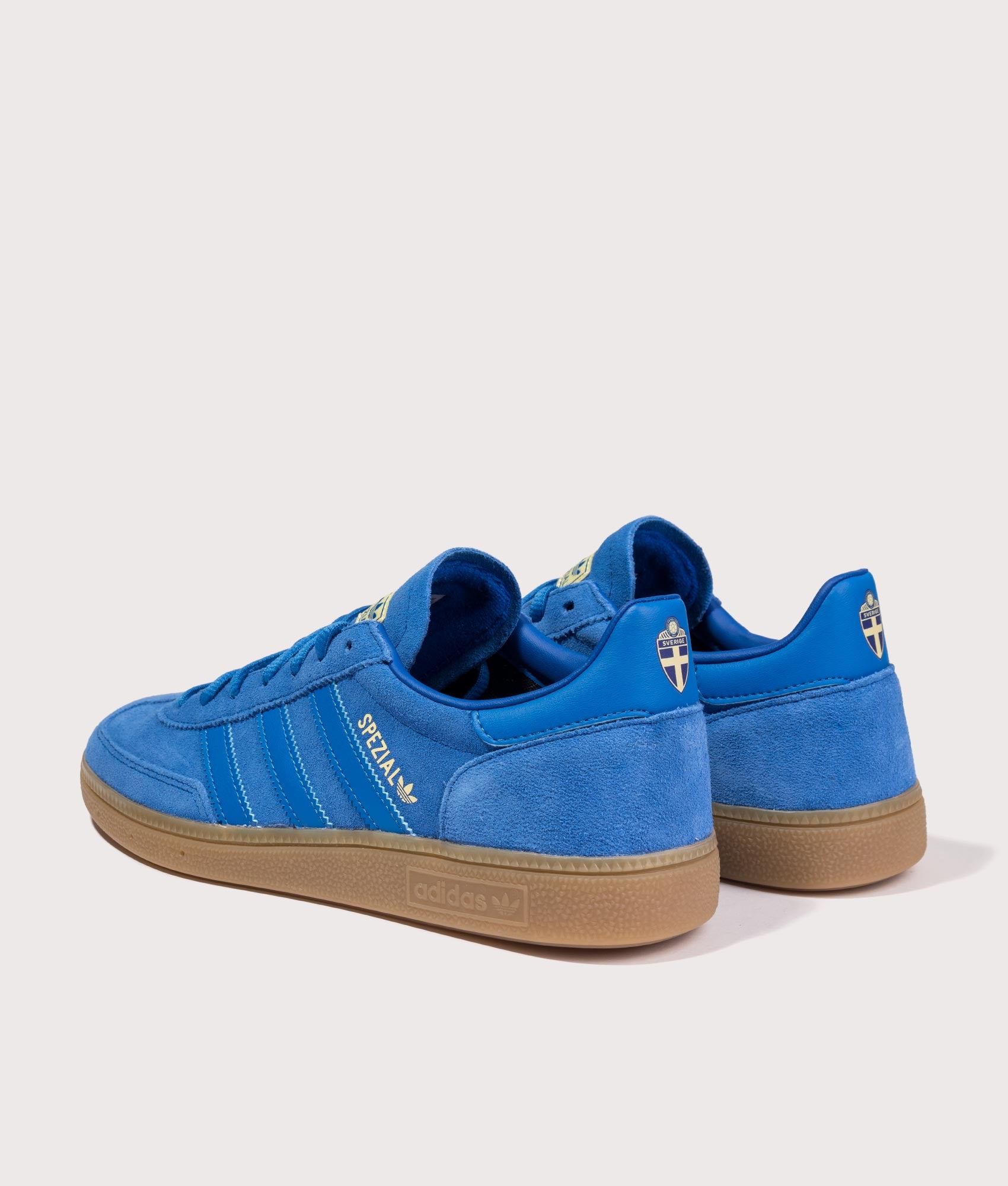adidas Originals Sweden Handball Spezial Trainers in Royal Blue at EQVVS Menswear. Angled back shot.