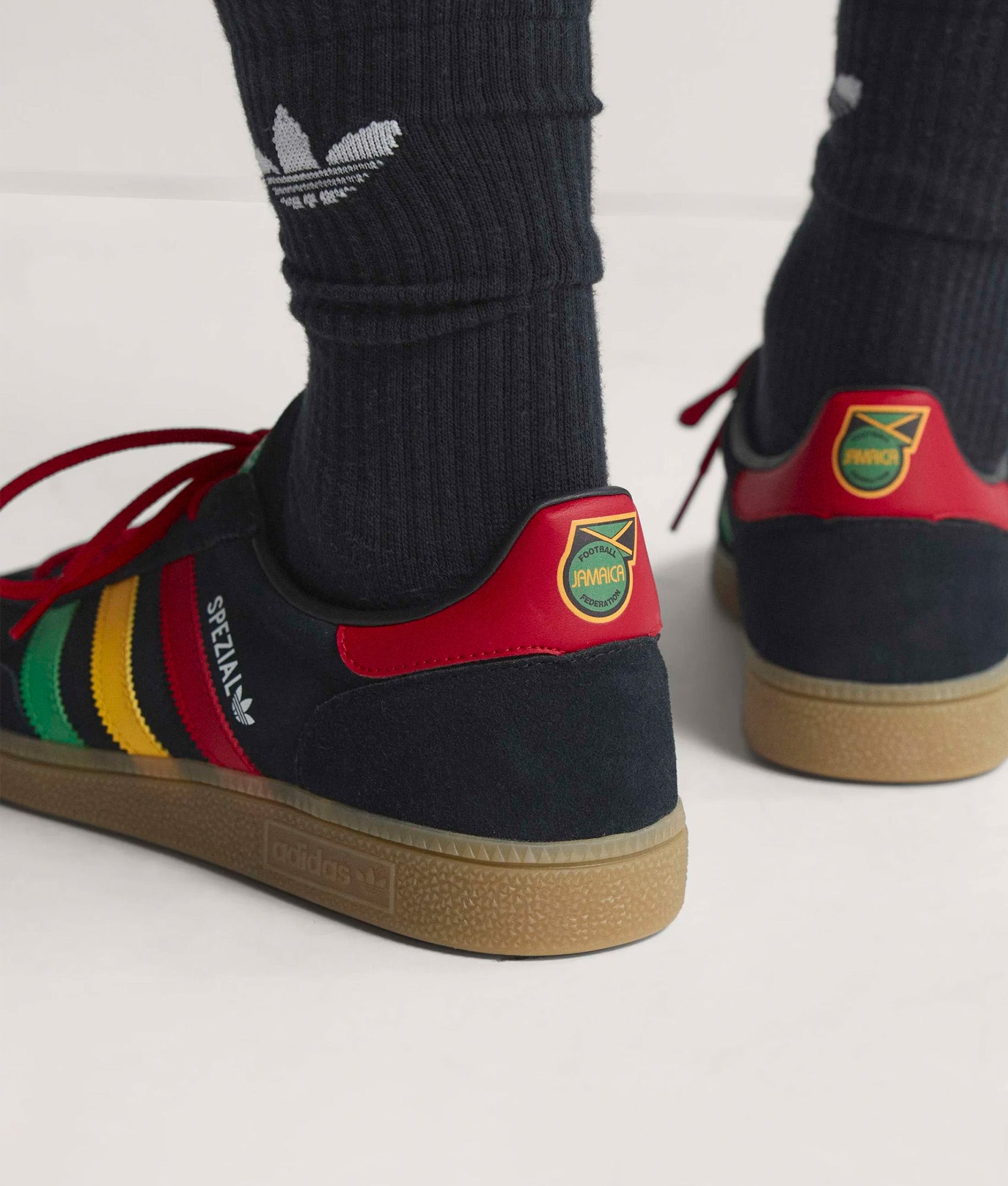 adidas Originals Jamaica X Bob Marley Handball Spezial Trainers in core Black, Pure Ruby and Bold Gold at EQVVS Menswear. Back shot.