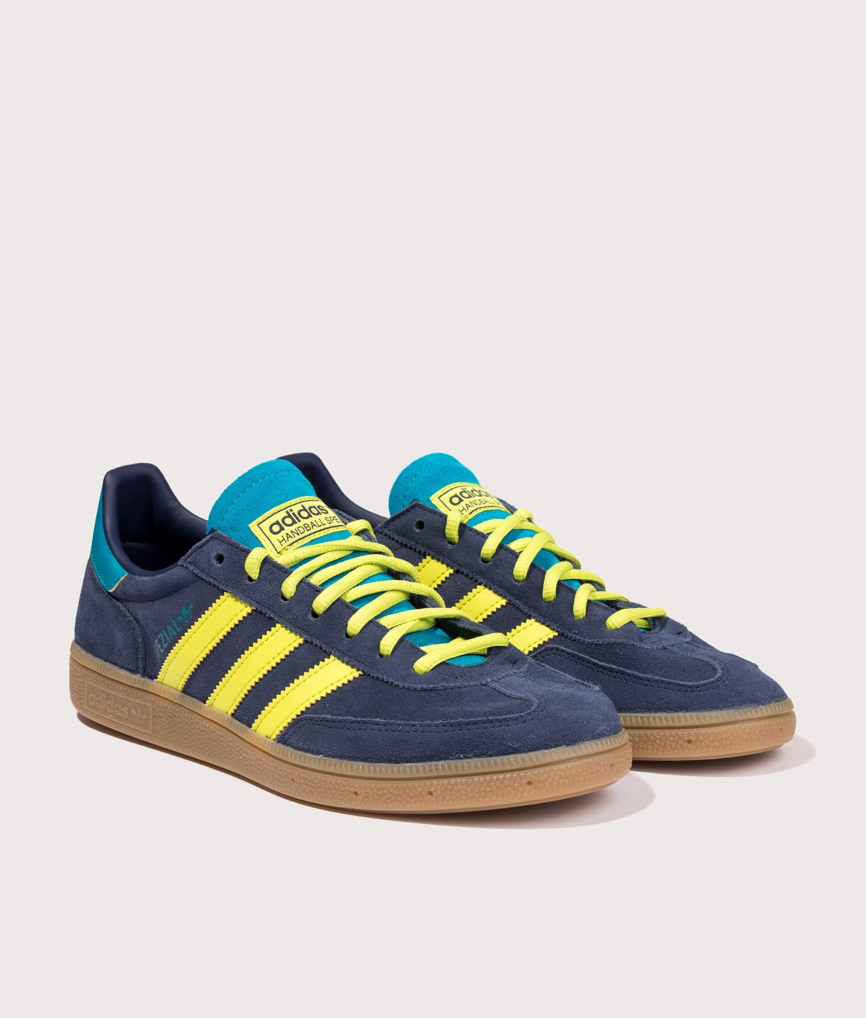 adidas Originals Columbia Handball Spezial Trainers in Navy at EQVVS Menswear. Angled front shot.