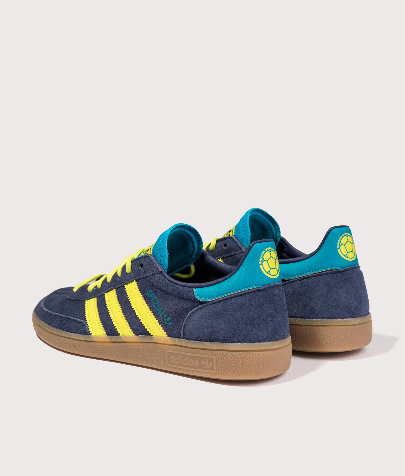 adidas Originals Columbia Handball Spezial Trainers in Navy at EQVVS Menswear. Angled back shot.