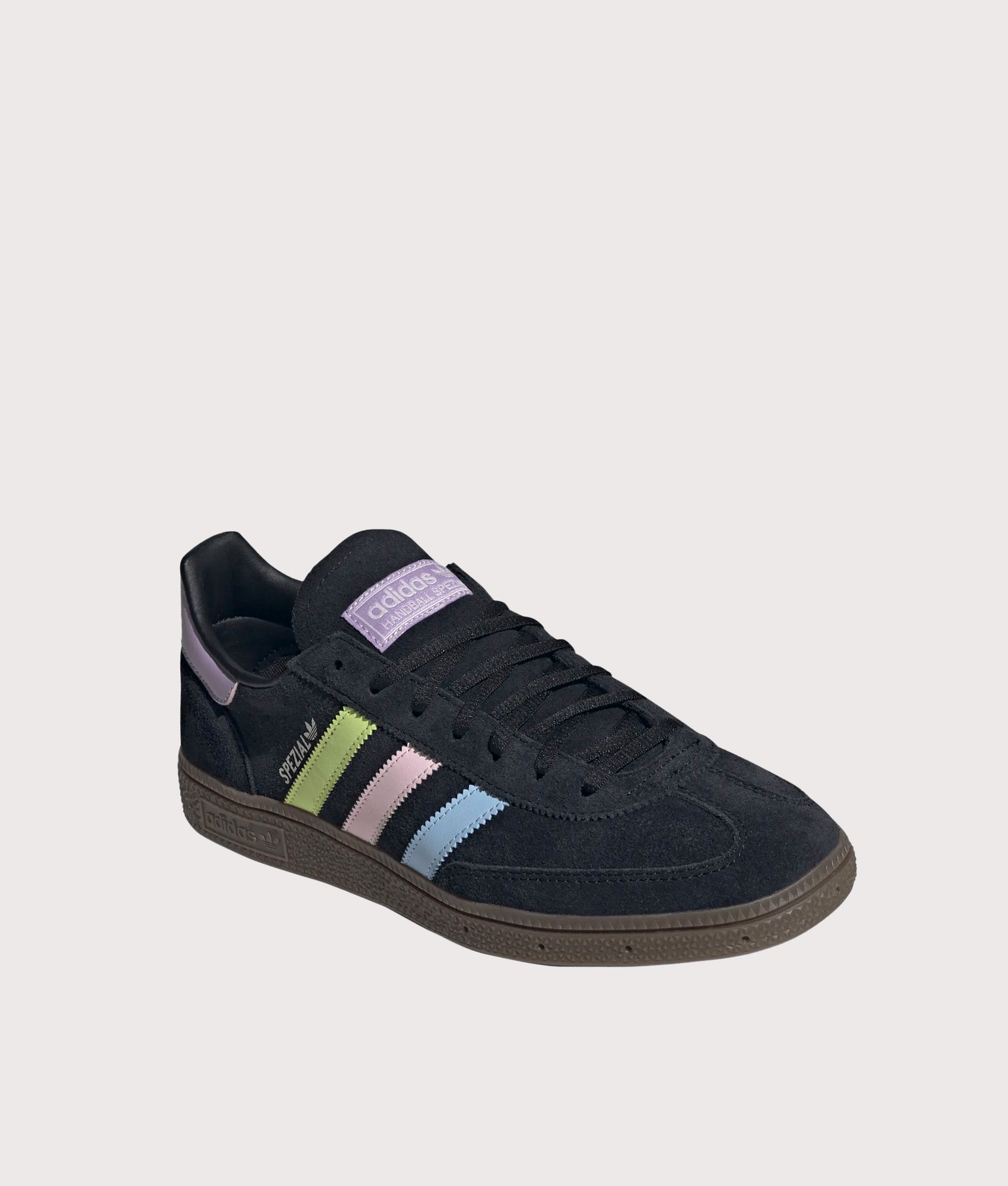 adidas Originals Japan Handball Spezial Trainers in Core Black, Glow Blue and Off White. Angled front shot.