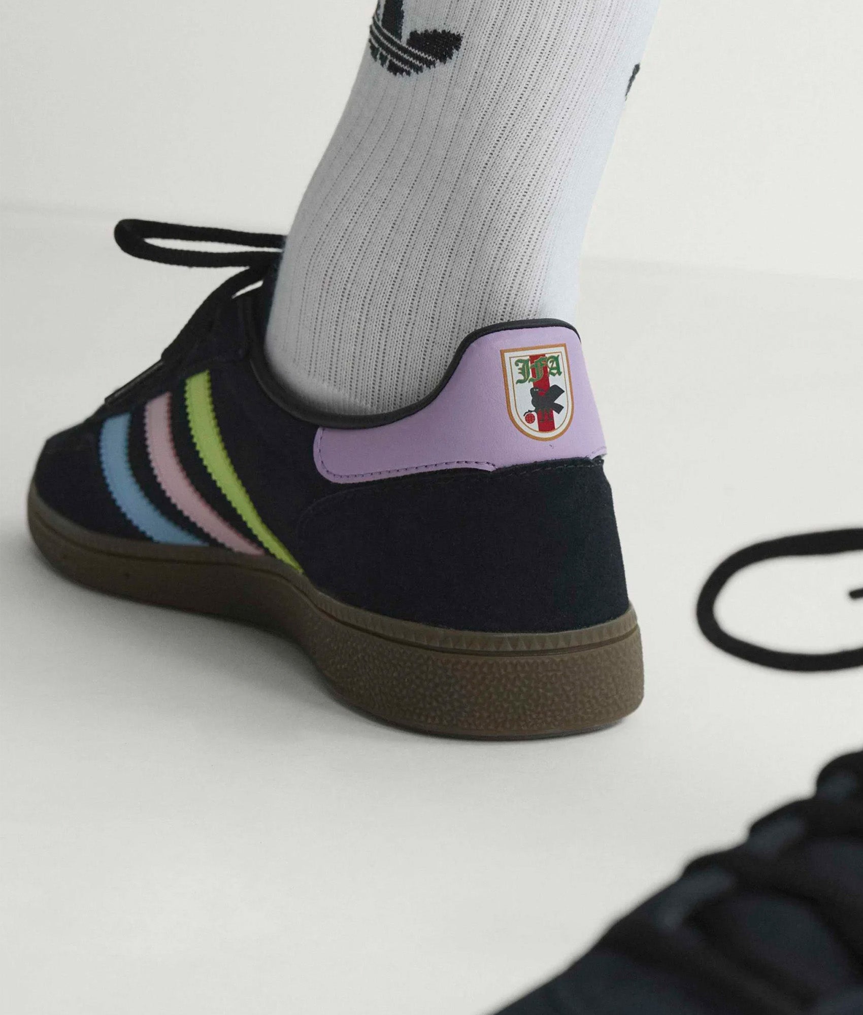 adidas Originals Japan Handball Spezial Trainers in Core Black, Glow Blue and Off White. Back shot.
