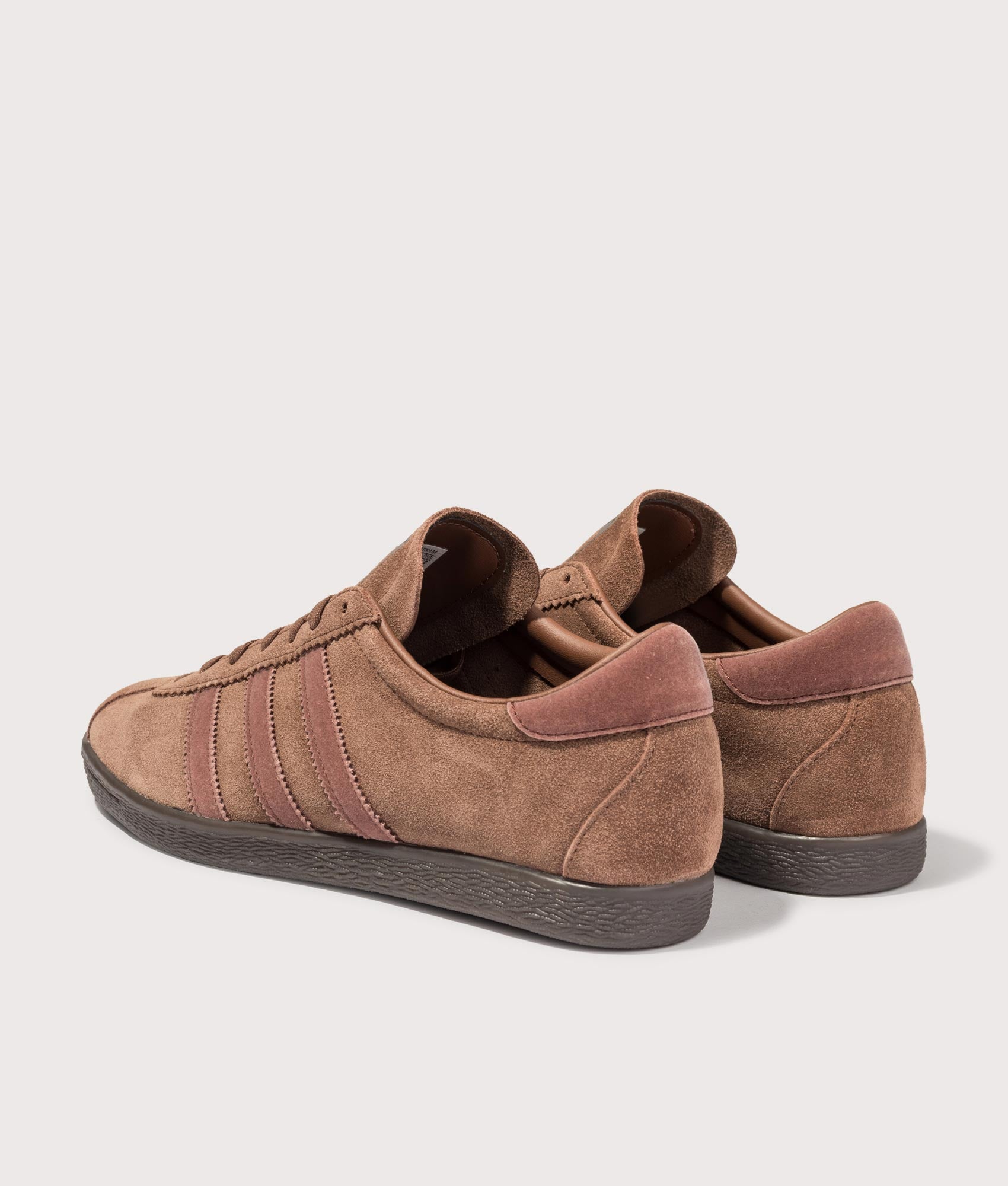adidas Original Tobacco Trainers in Preloved Brown, Fox Brown and Dark Brown at EQVVS Menswear. Angled back shot.