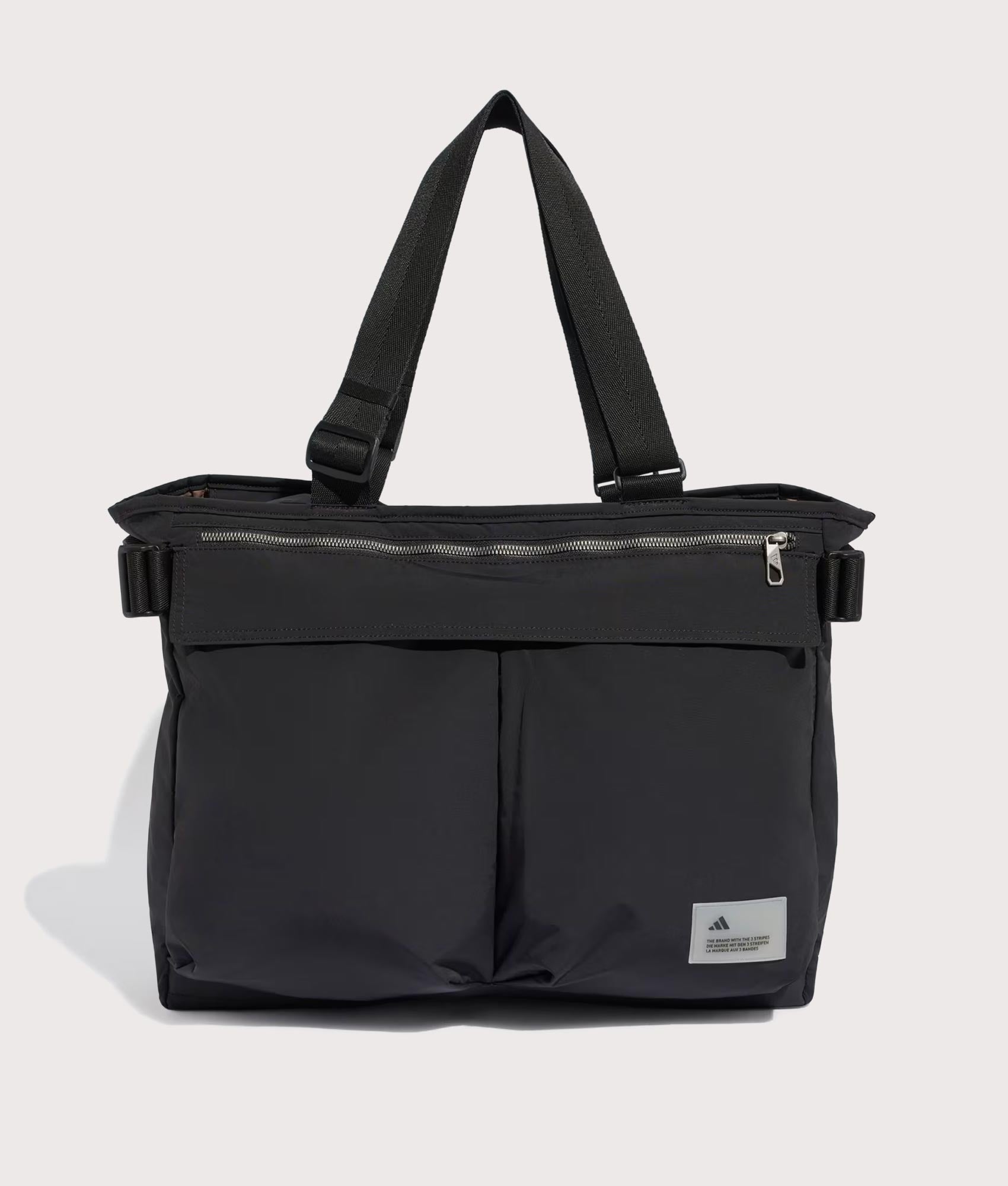 adidas Originals City Tech Tote Bag in Black at EQVVS Menswear. Front shot.