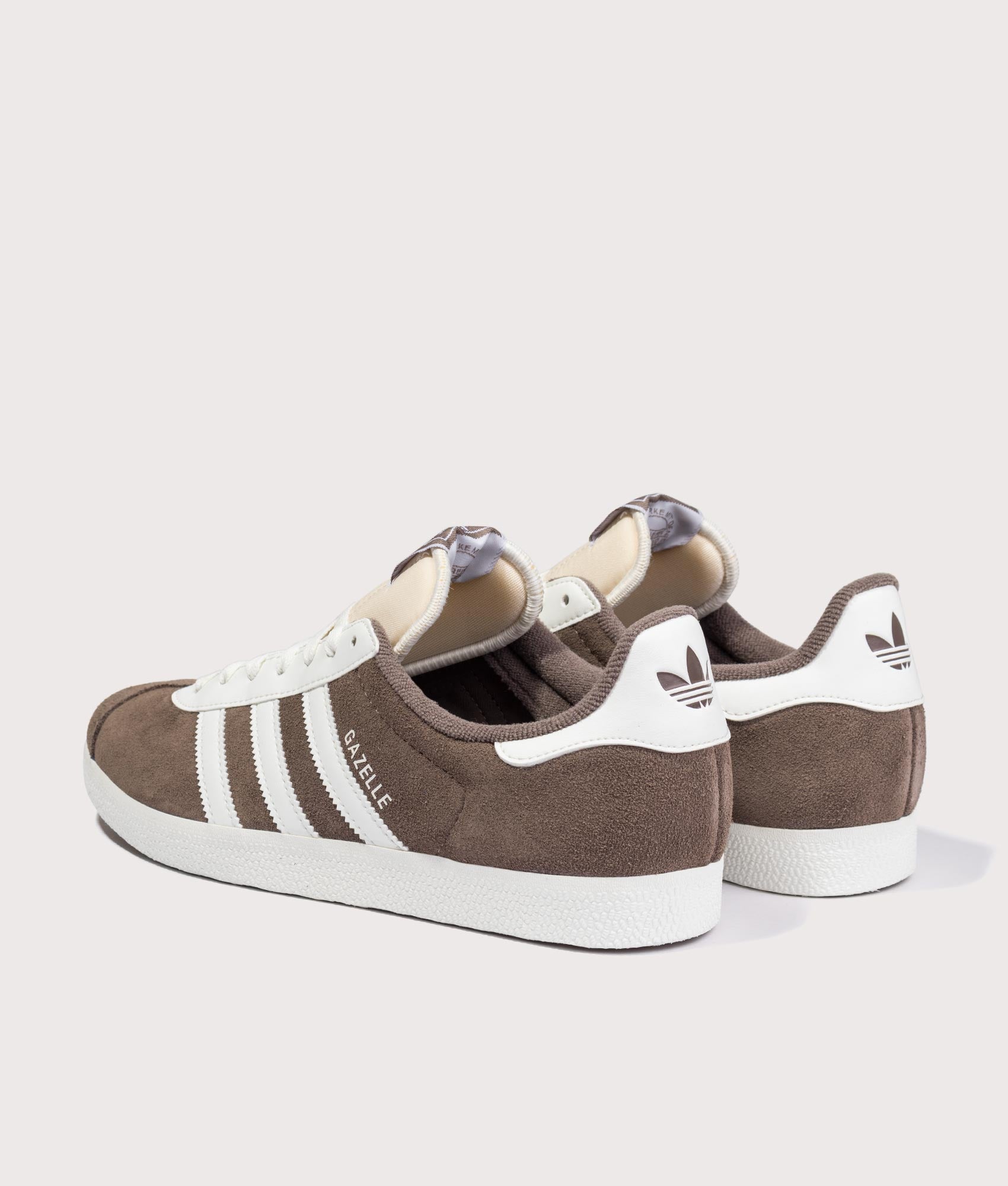 adidas Originals Gazelle trainers in Earth Strata and Off White at EQVVS Menswear. Angled back shot.