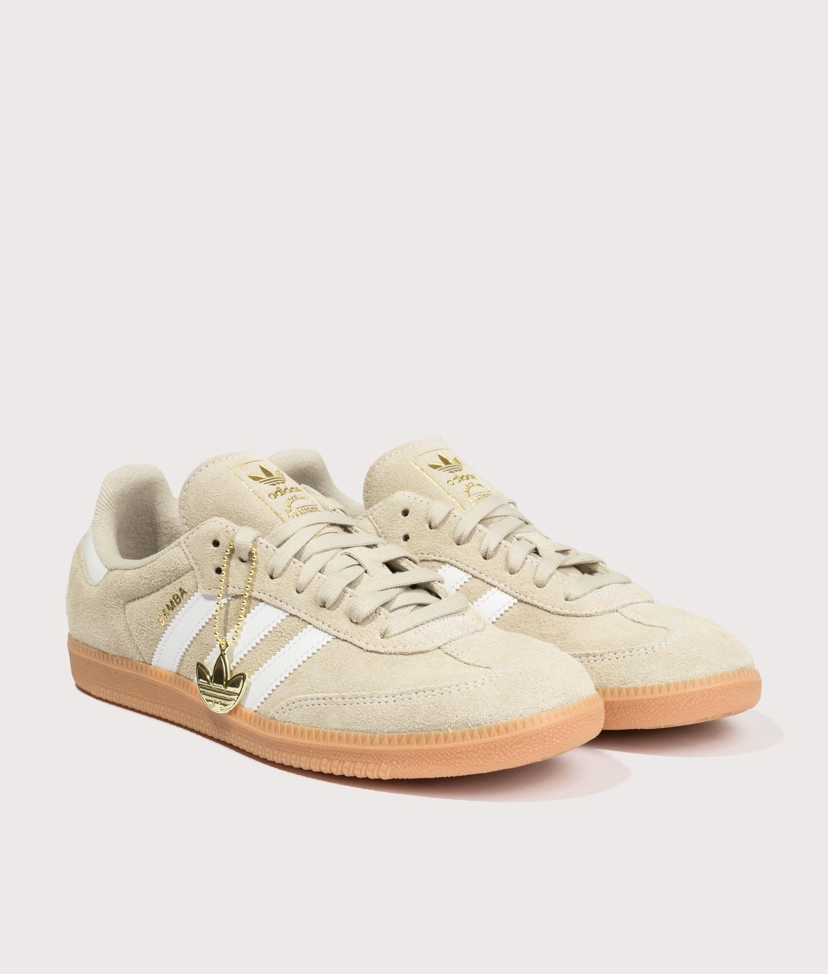 adidas Originals Samba OG Trainers in Khaki Three, Footwear White and Gum 2 at EQVVS Menswear. Angled front shot.
