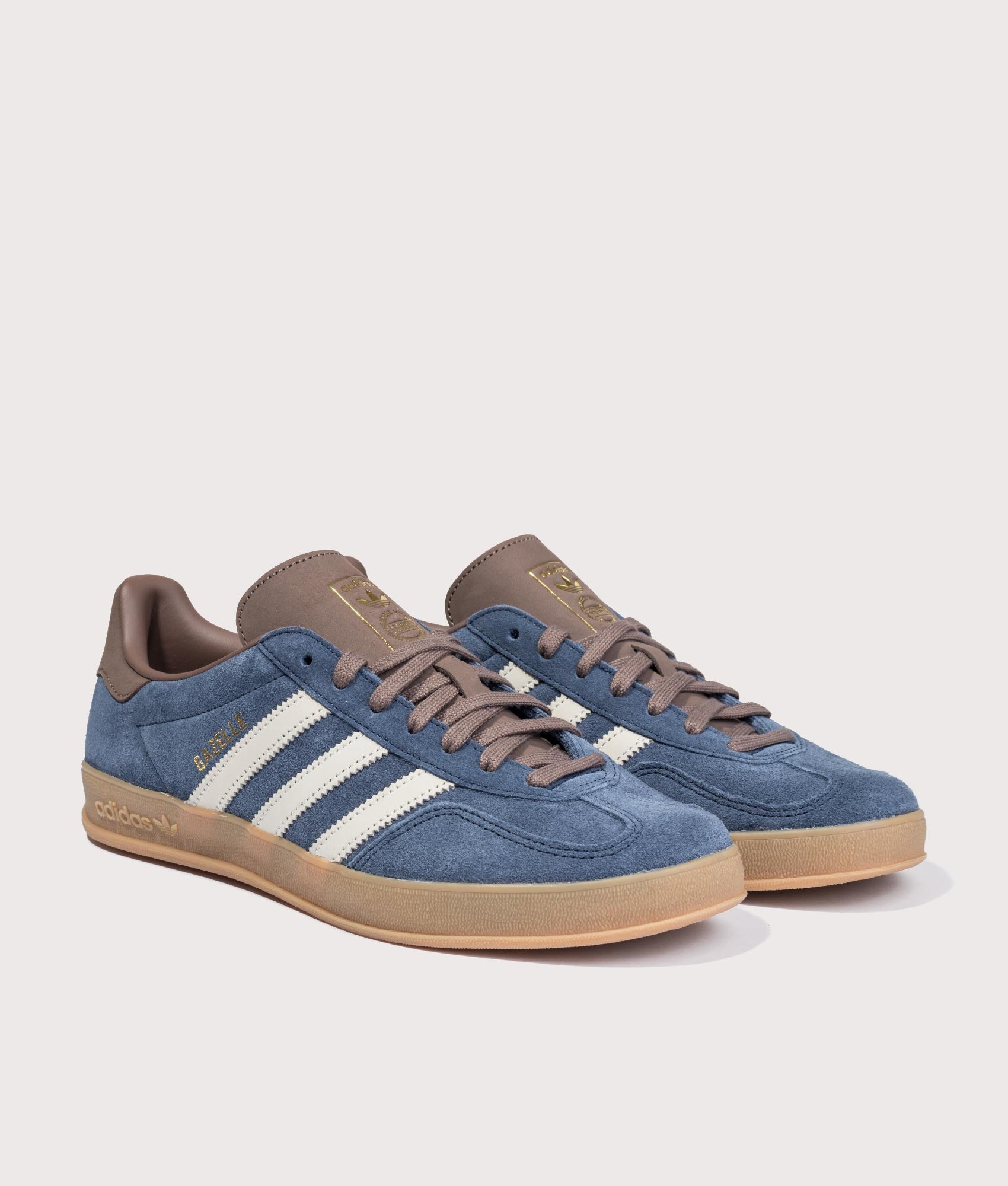 adidas Originals Gazelle Indoor Trainers in Night Indigo, Off White and Earth Strata at EQVVS Menswear. Angled front shot.