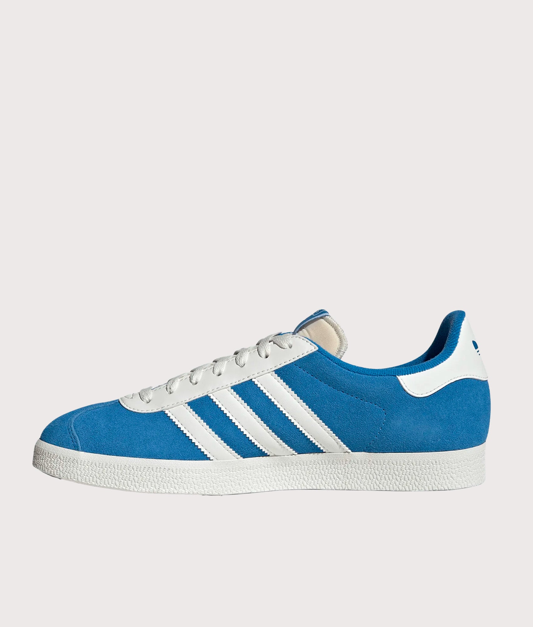 adidas Originals Gazelle Trainers in Bright Blue and Off White at EQVVS Menswear. Side shot.