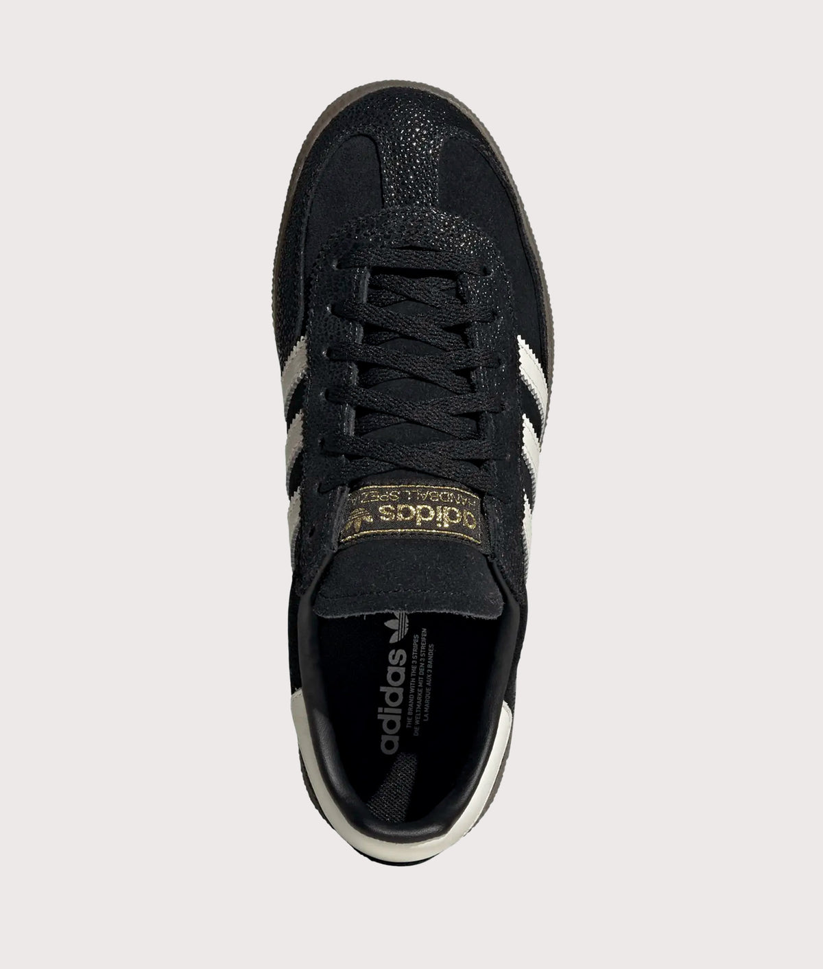 adidas Originals Handball Spezial Trainers in Core Black, Cloud White and Gold Metallic at EQVVS Menswear. Top shot.